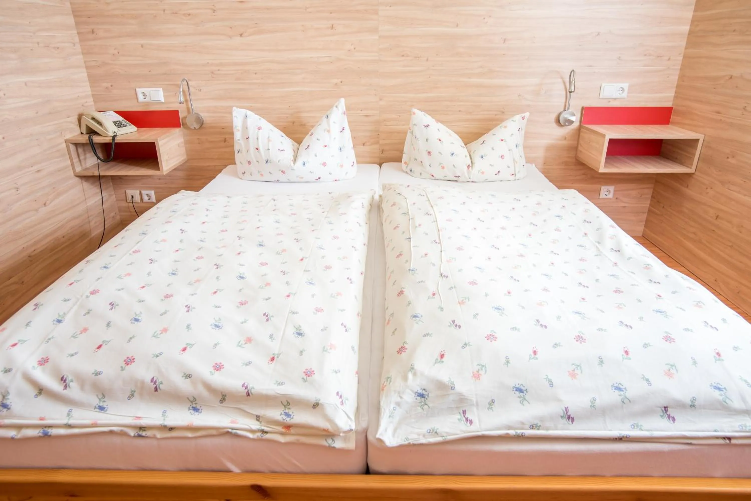 Bed in Hotel Schweizerhof