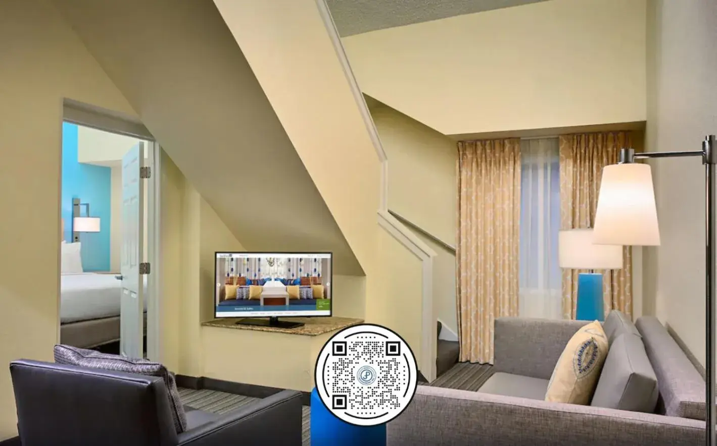 Communal lounge/ TV room, Bed in Sonesta Simply Suites Memphis East Poplar Pike Communal lounge/ TV room, Bed in Sonesta Simply Suites Memphis East Poplar Pike