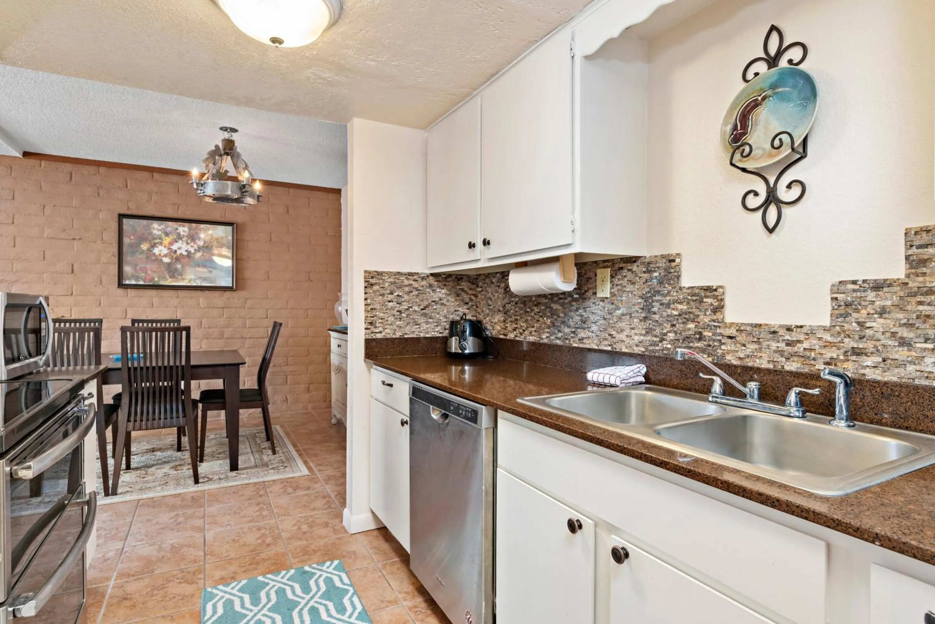 kitchen in Fort Marcy Suites by All Seasons Resort Lodging