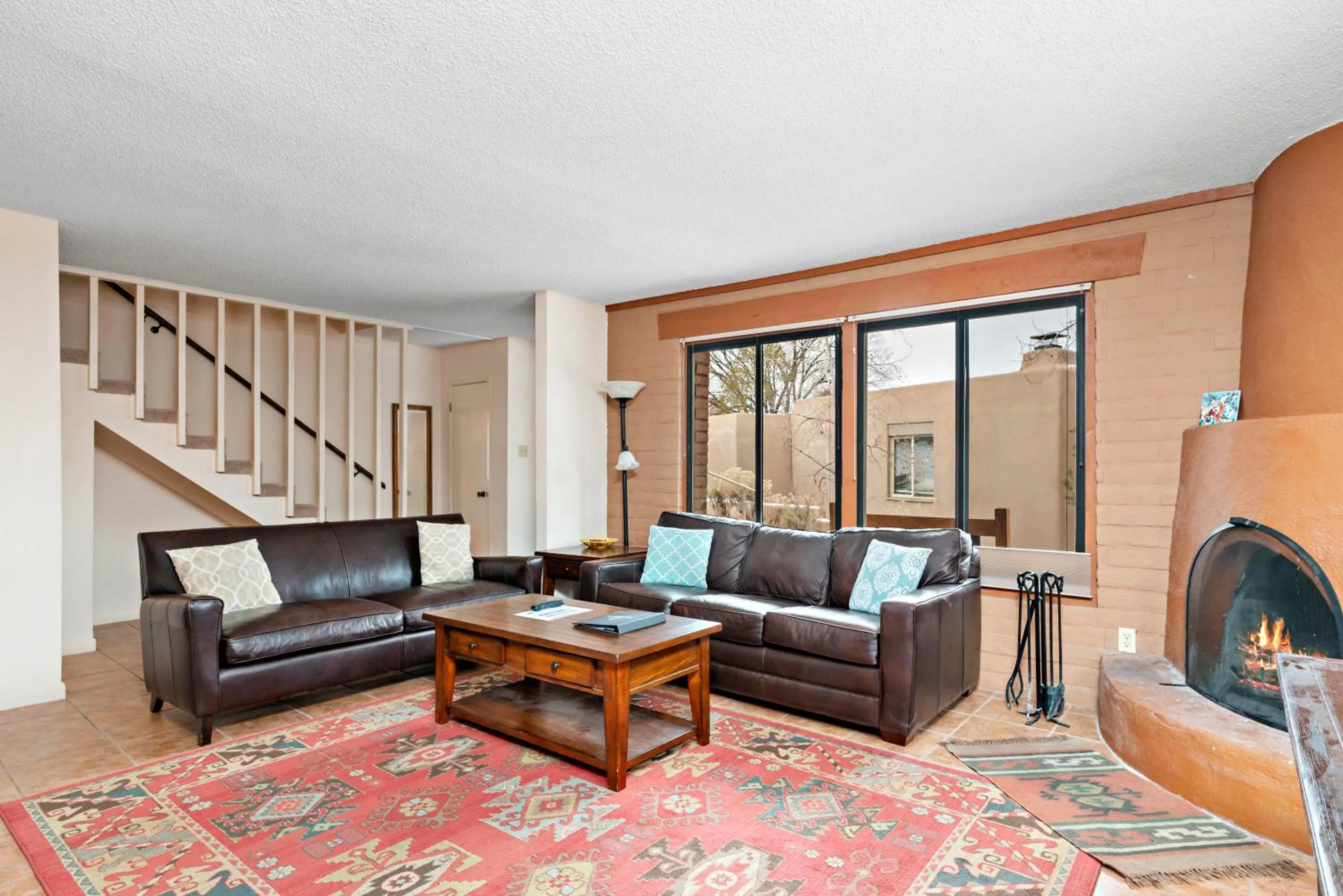 Living room in Fort Marcy Suites by All Seasons Resort Lodging