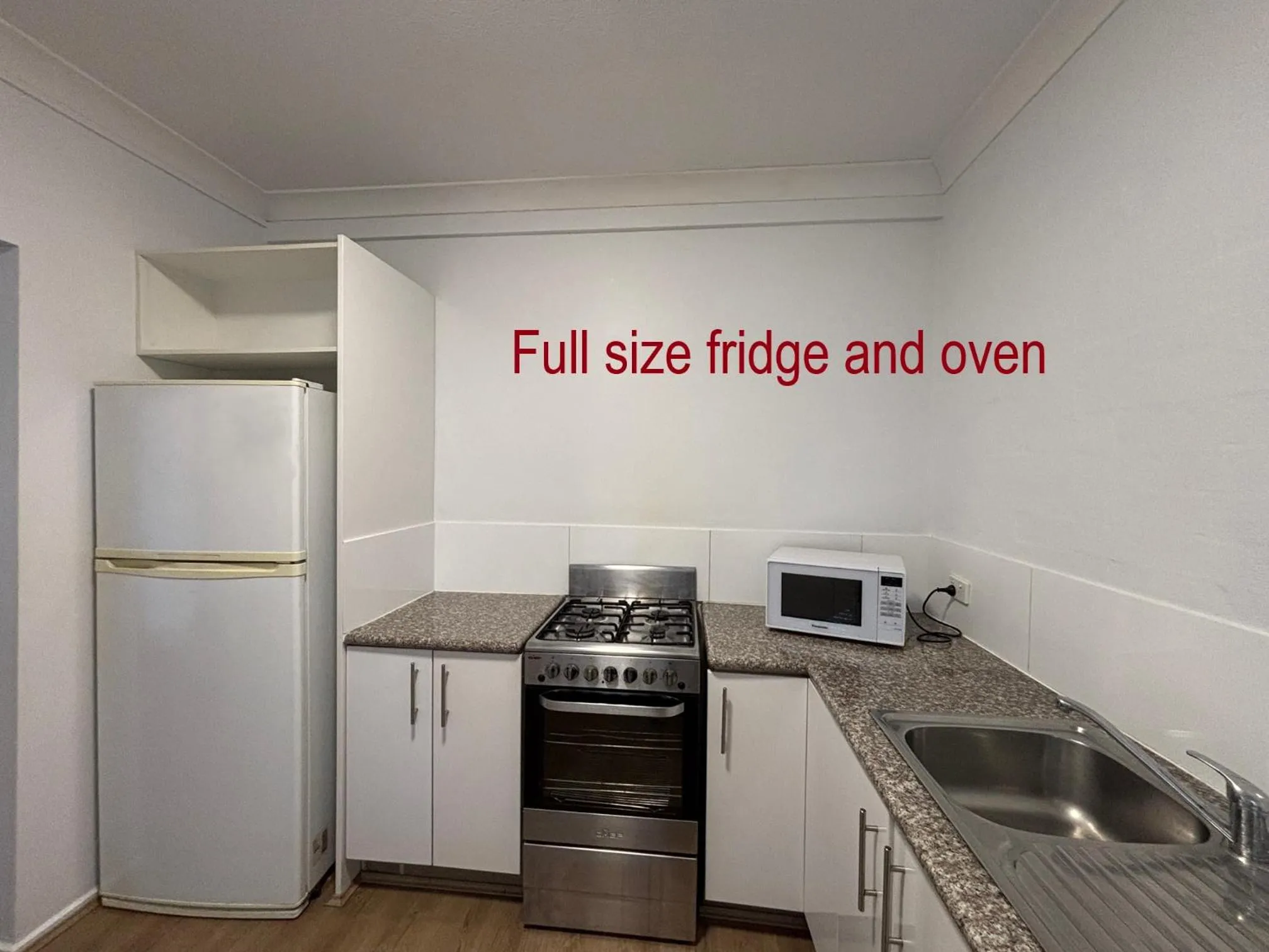 kitchen in Oxley Court Serviced Apartments