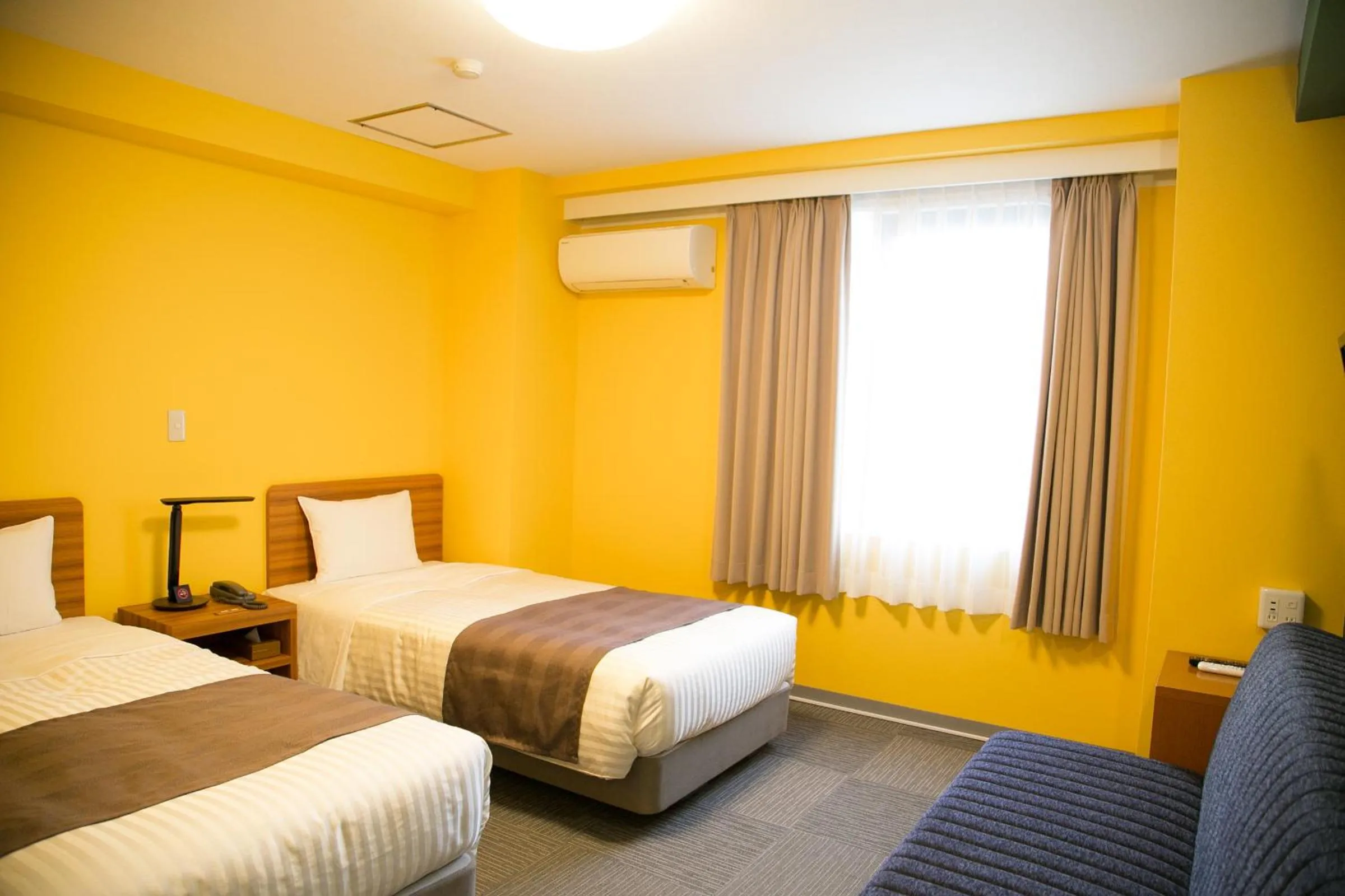 Bed in Tokyo Ueno New Izu Hotel