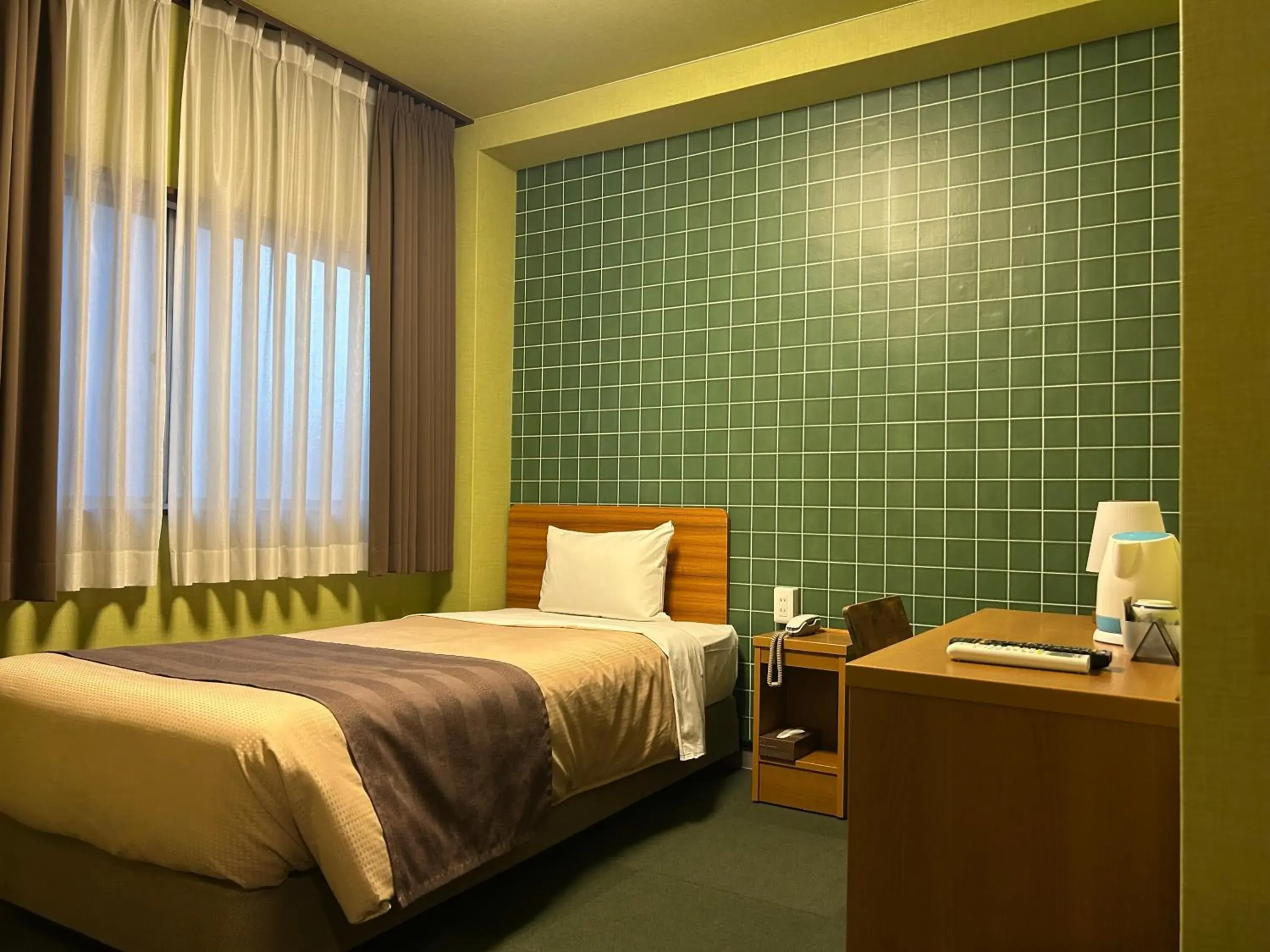 Bed in Tokyo Ueno New Izu Hotel Bed in Tokyo Ueno New Izu Hotel