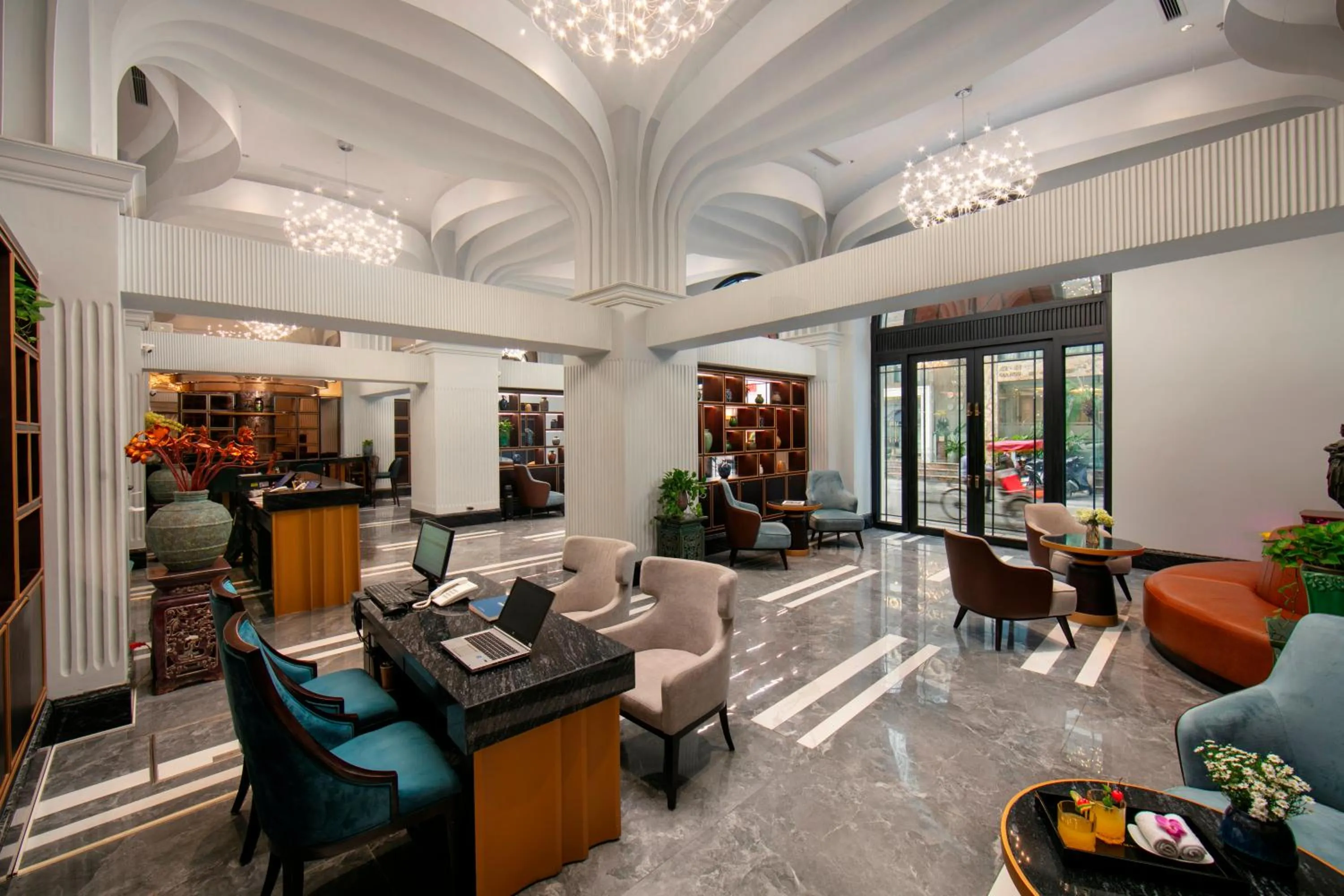 Lobby or reception in MAY DE VILLE Lakeside Hotel