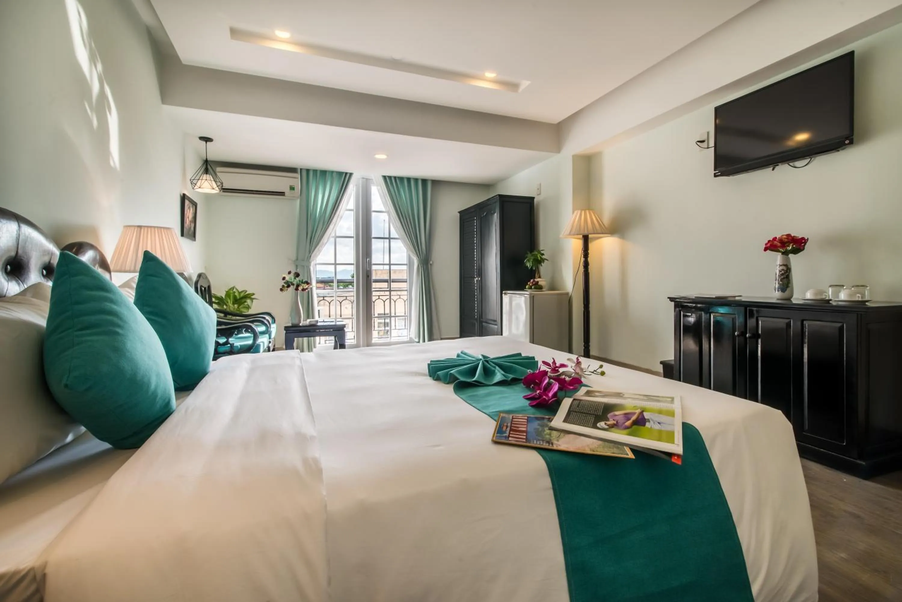 Photo of the whole room, Bed in The Sunriver Boutique Hotel Hue