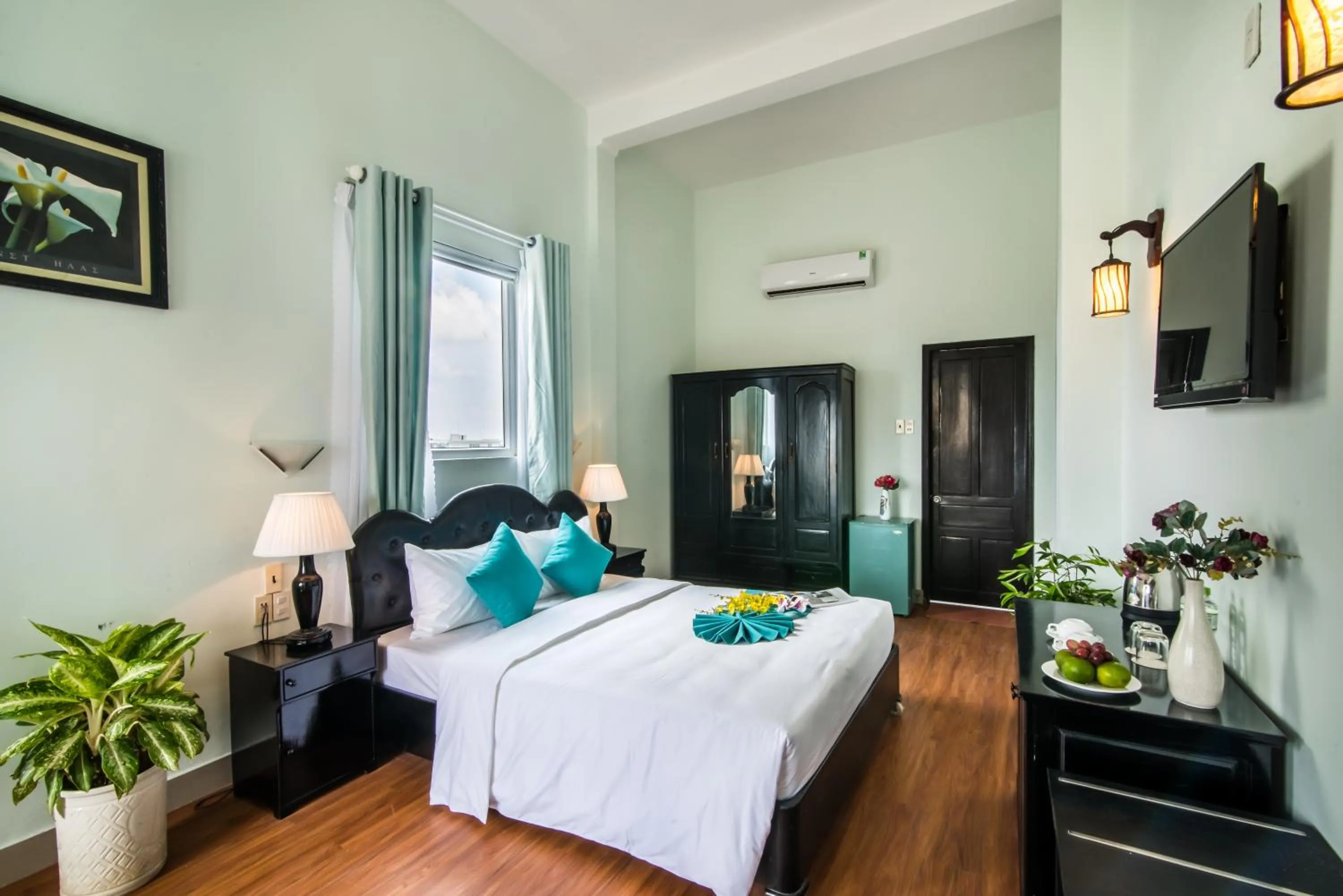 Photo of the whole room, Bed in The Sunriver Boutique Hotel Hue