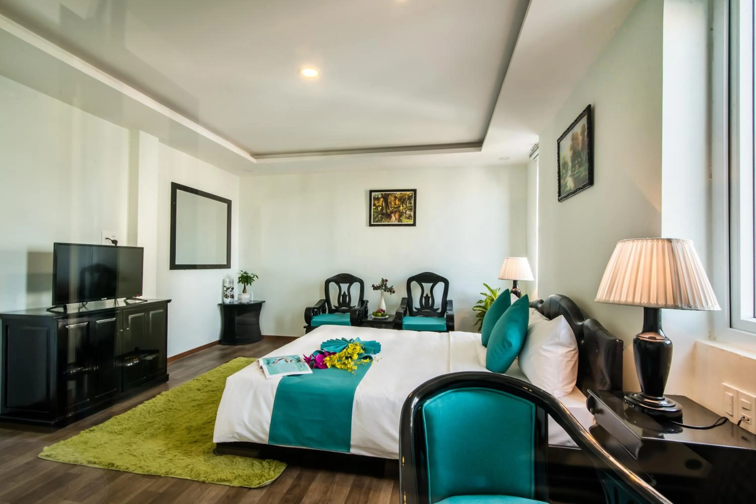 Photo of the whole room, Bed in The Sunriver Boutique Hotel Hue