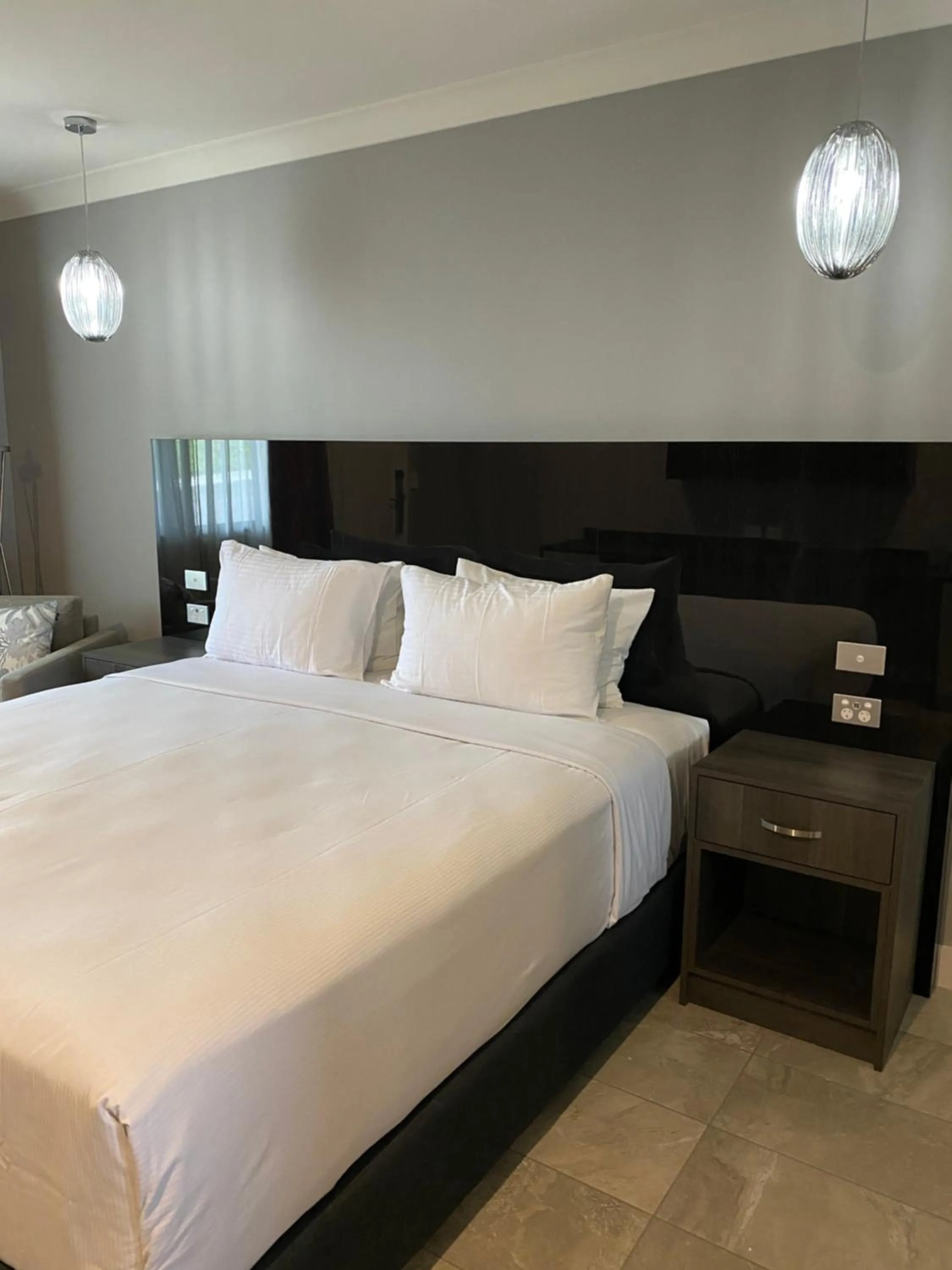 Bed in Sunseeker Motor Inn