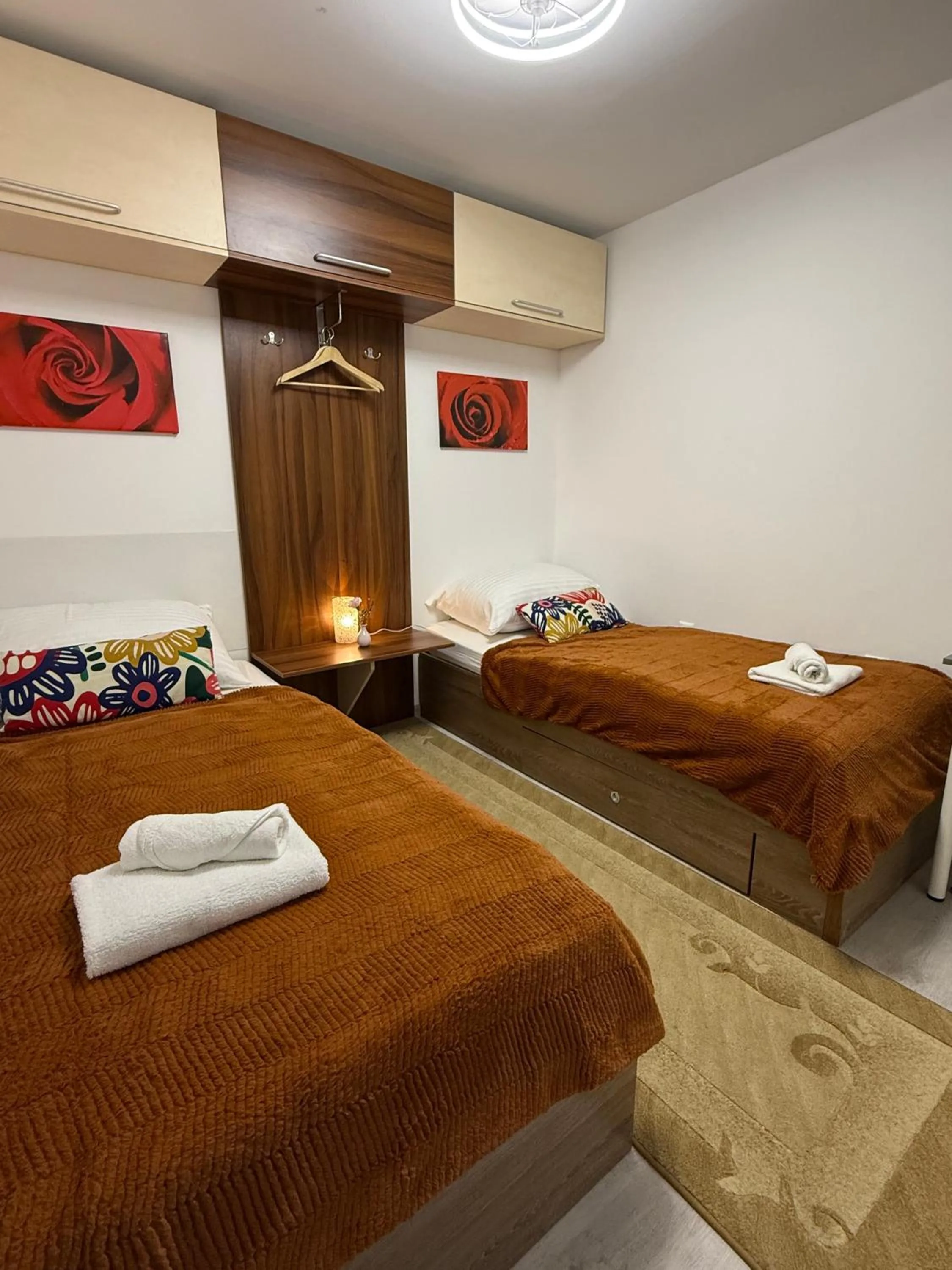 Bed in Le Rose Suites & Park Hotel