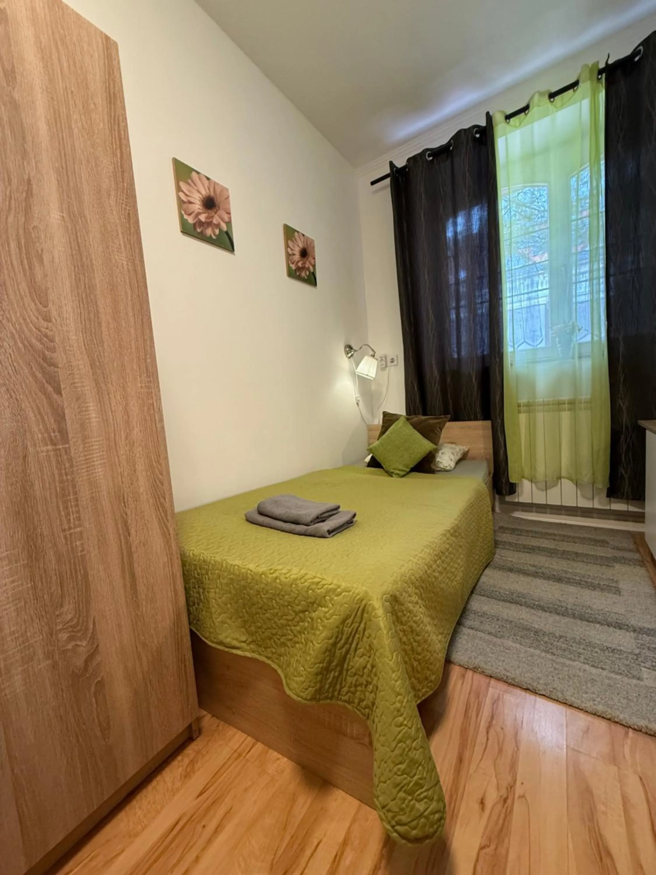 Bed in Le Rose Suites & Park Hotel