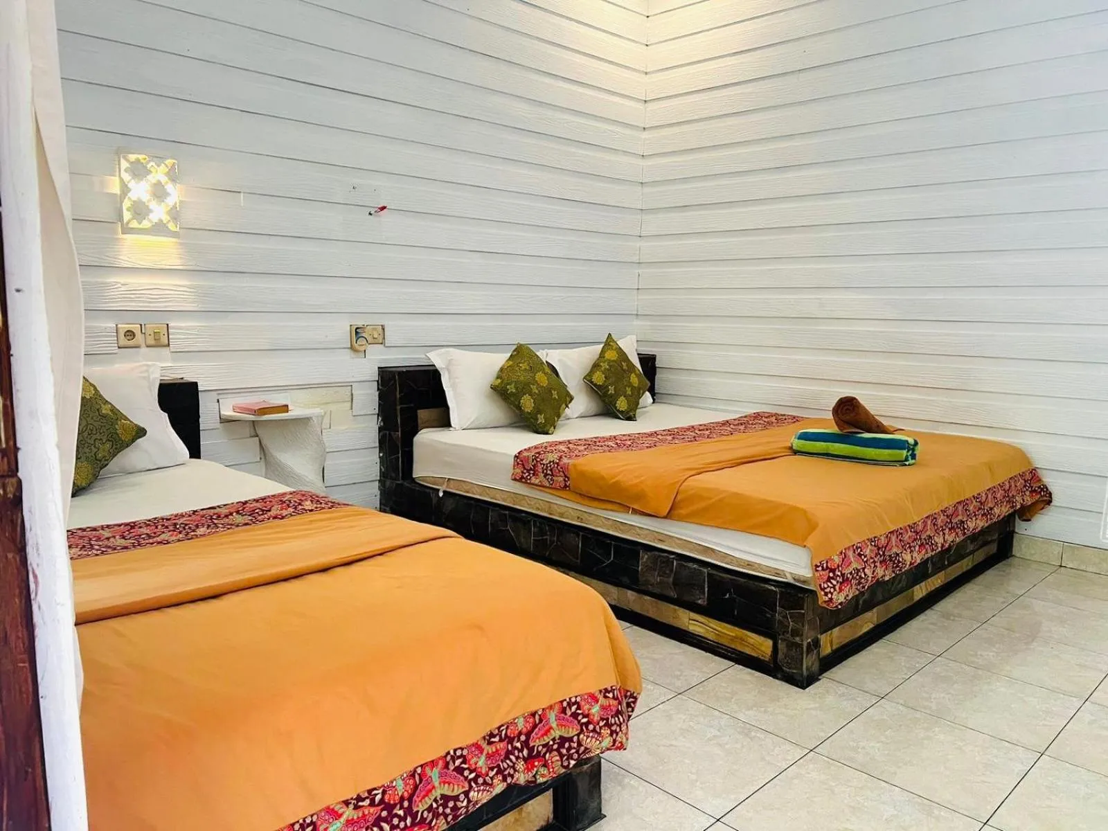 Bed in Tarci Bungalows Lembongan