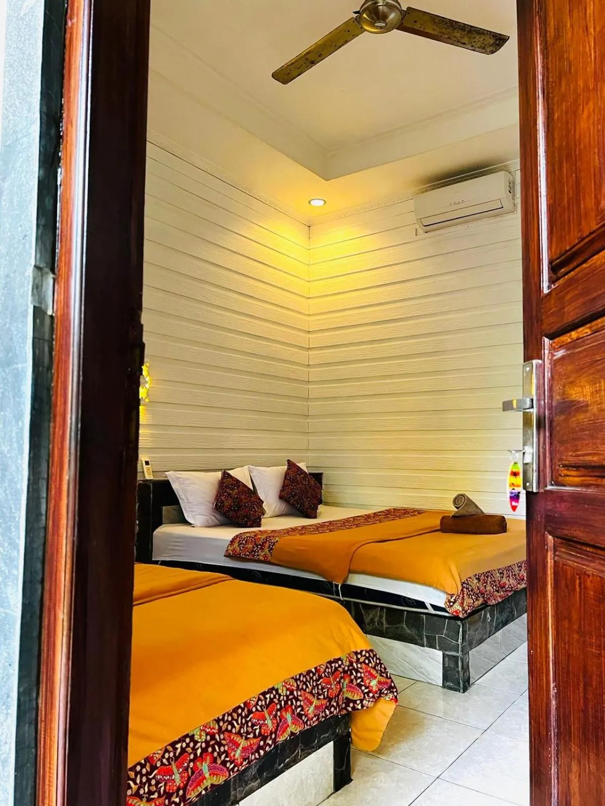 Bed in Tarci Bungalows Lembongan