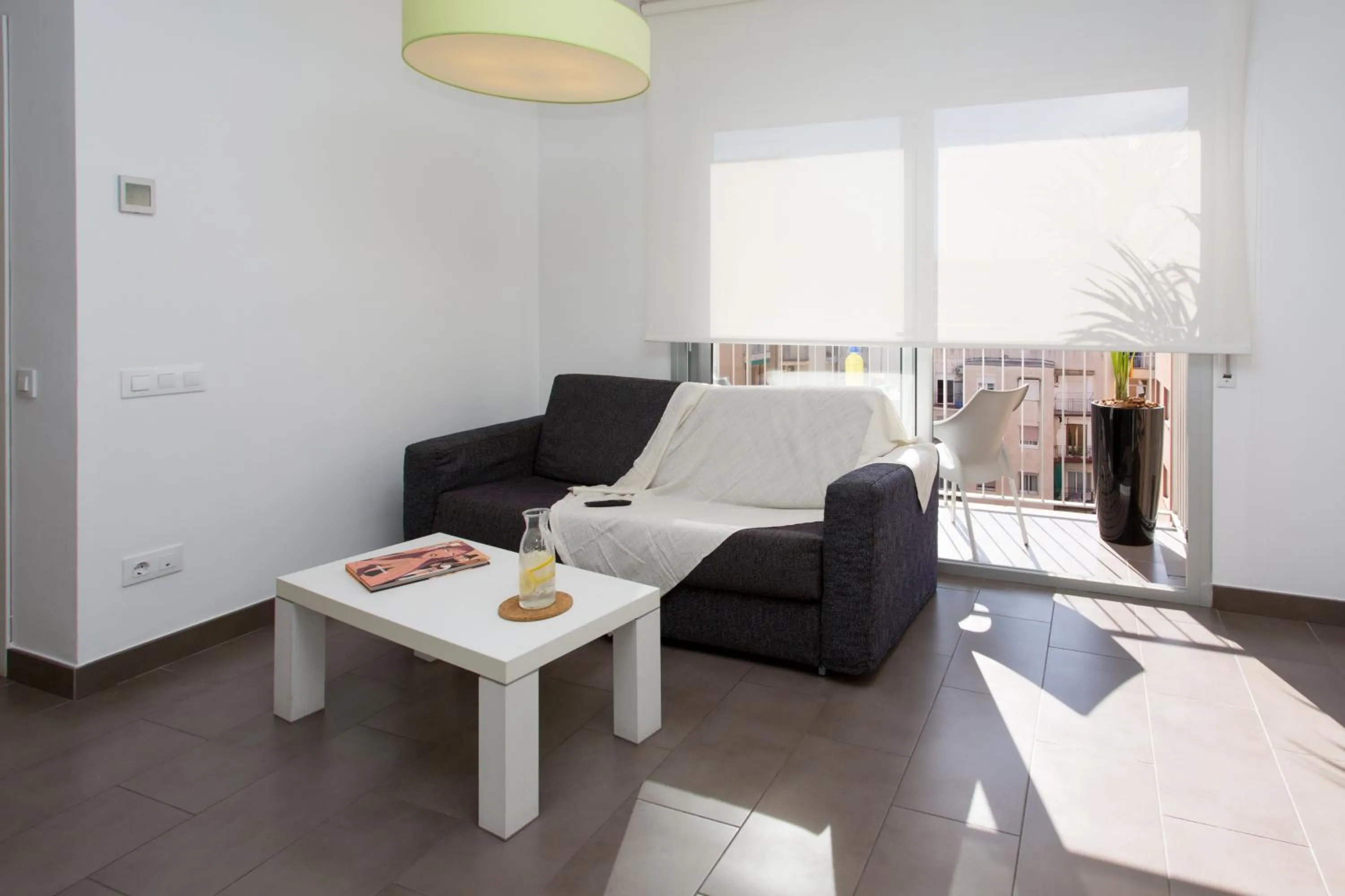 Living room in 08028 Apartments