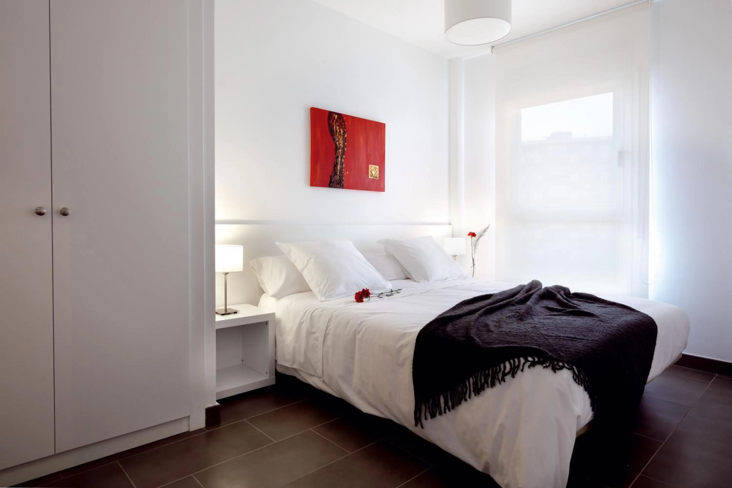 Bed in 08028 Apartments