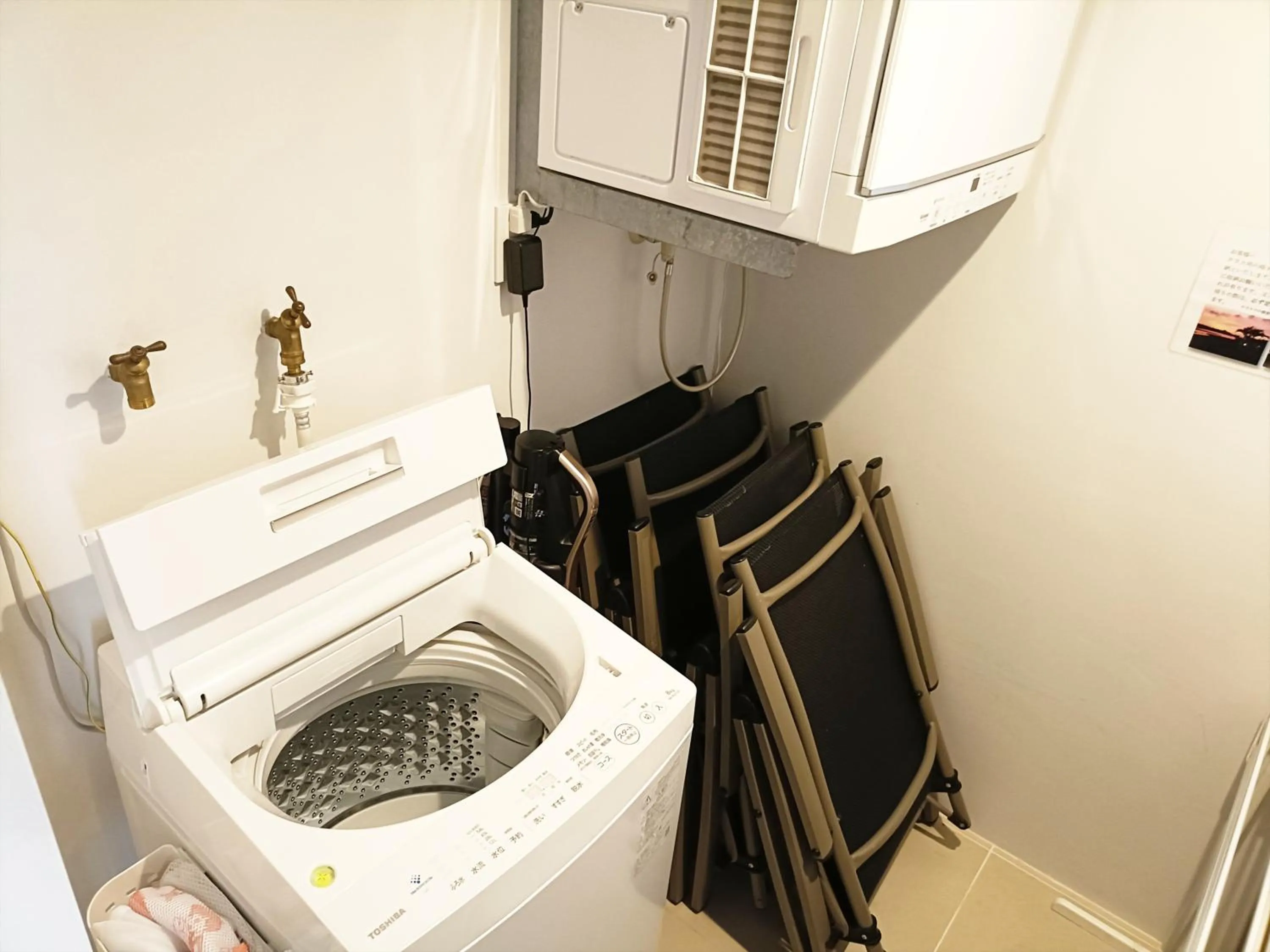laundry in Kariyushi Condominium Resort Onna Maeda Base