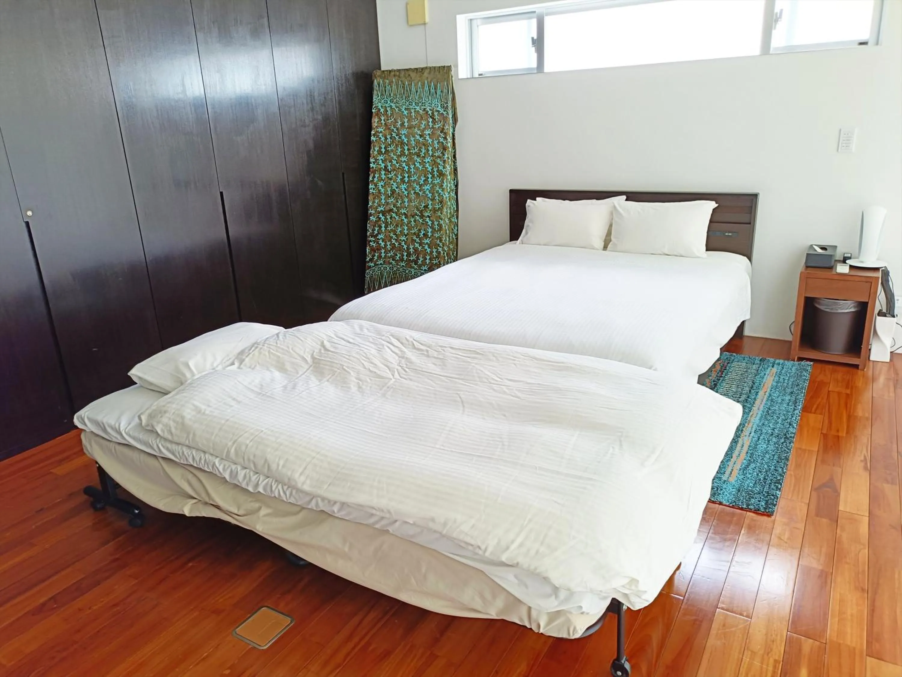 Bedroom, Bed in Kariyushi Condominium Resort Onna Maeda Base