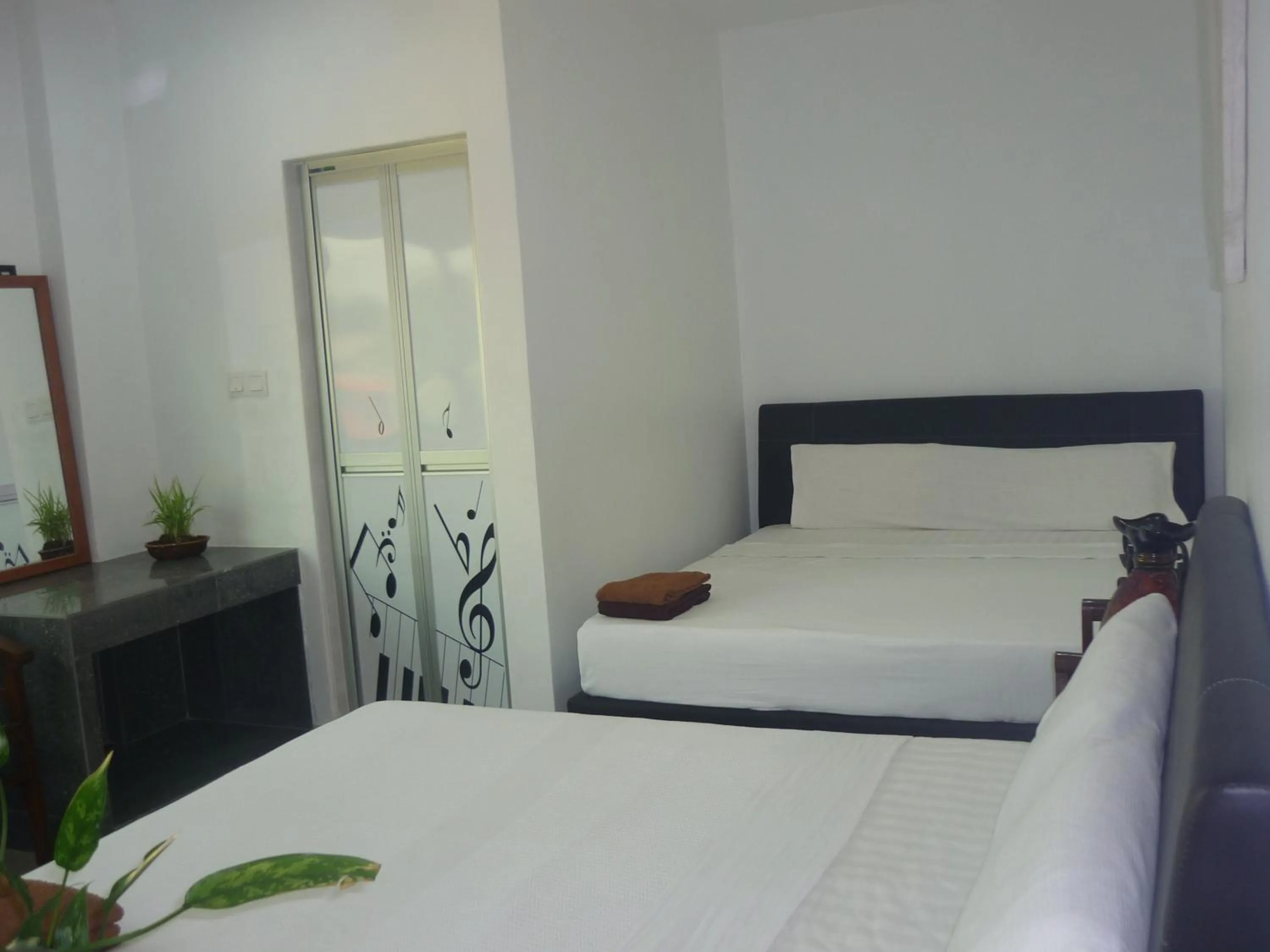 Bed in Hotel Paka INN