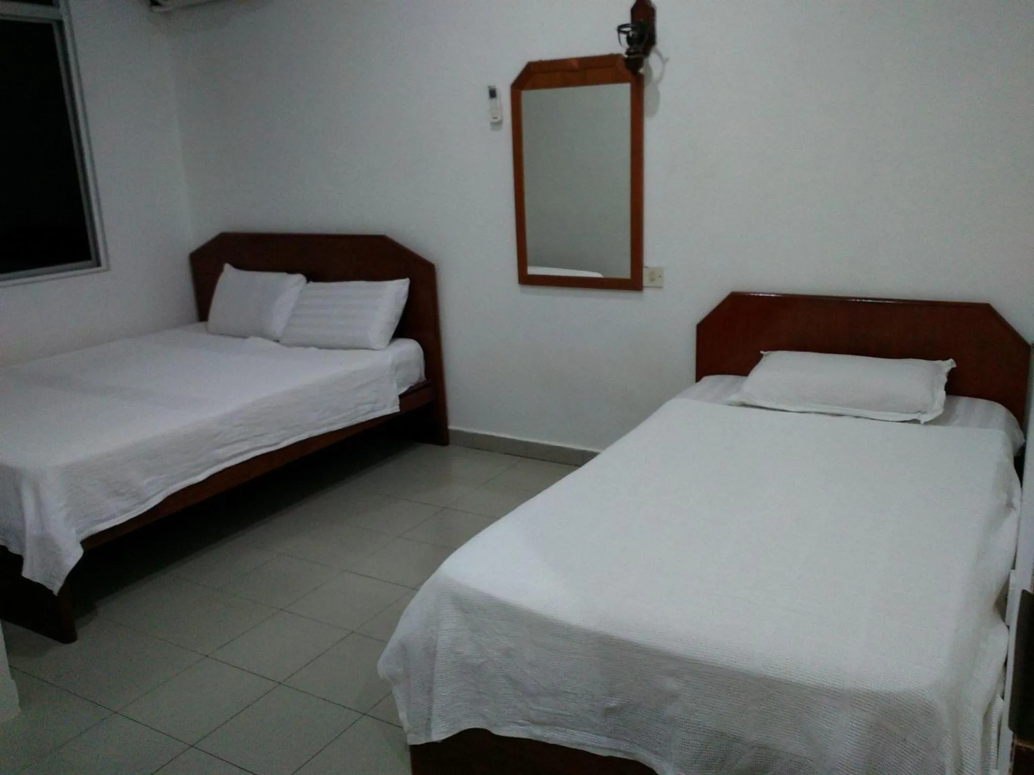 Photo of the whole room, Bed in Hotel Paka INN