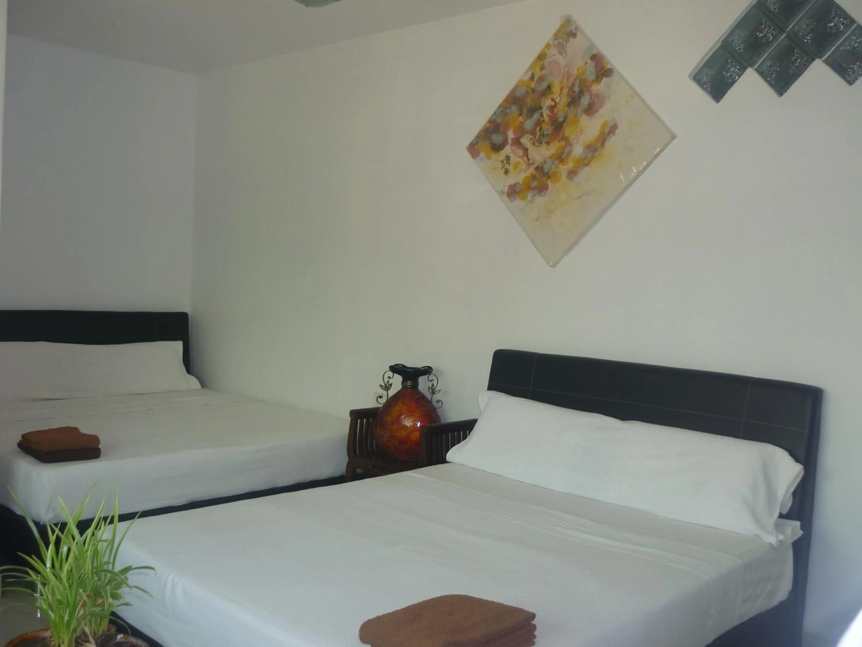 Bed in Hotel Paka INN