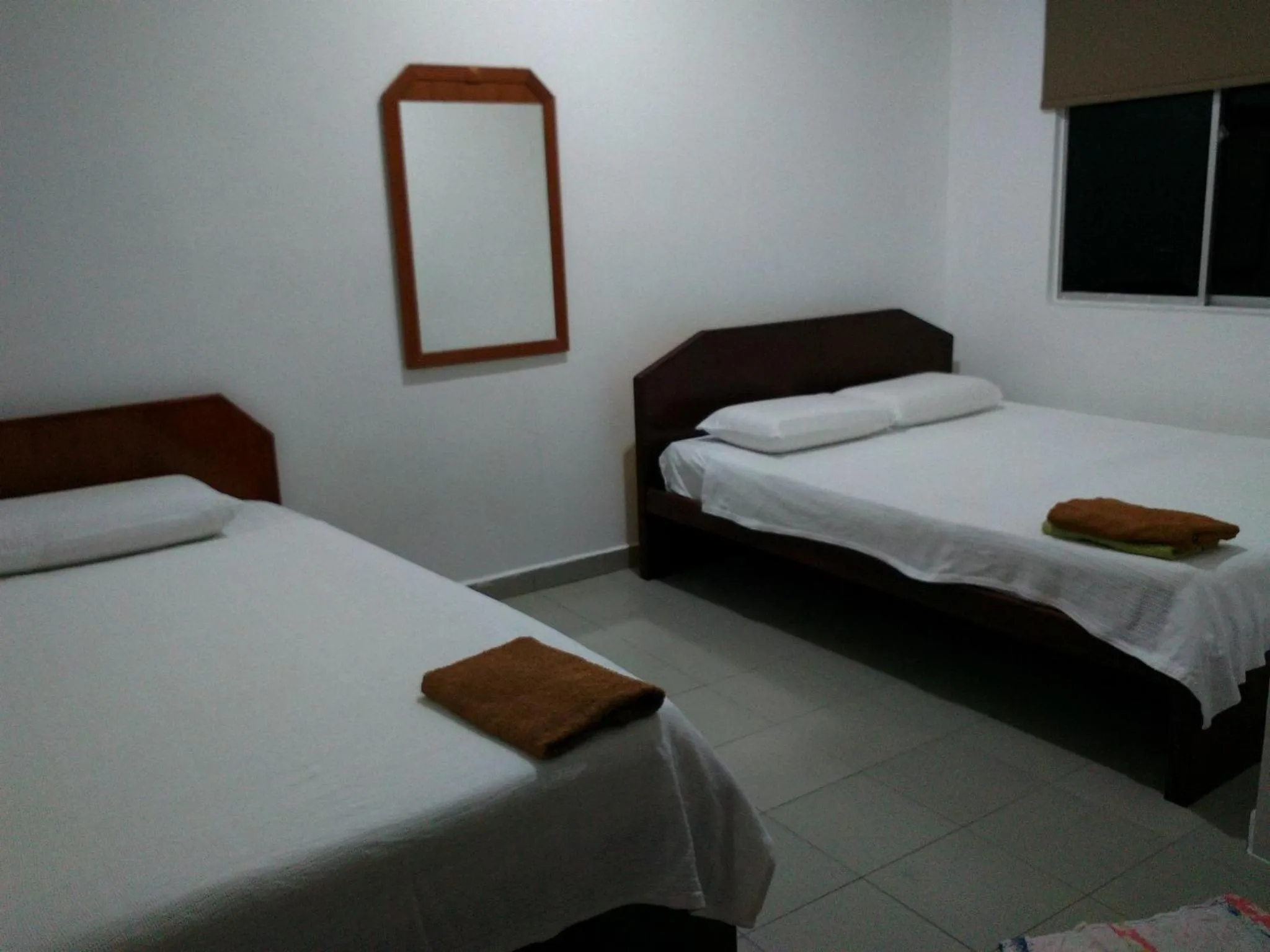 Photo of the whole room, Bed in Hotel Paka INN
