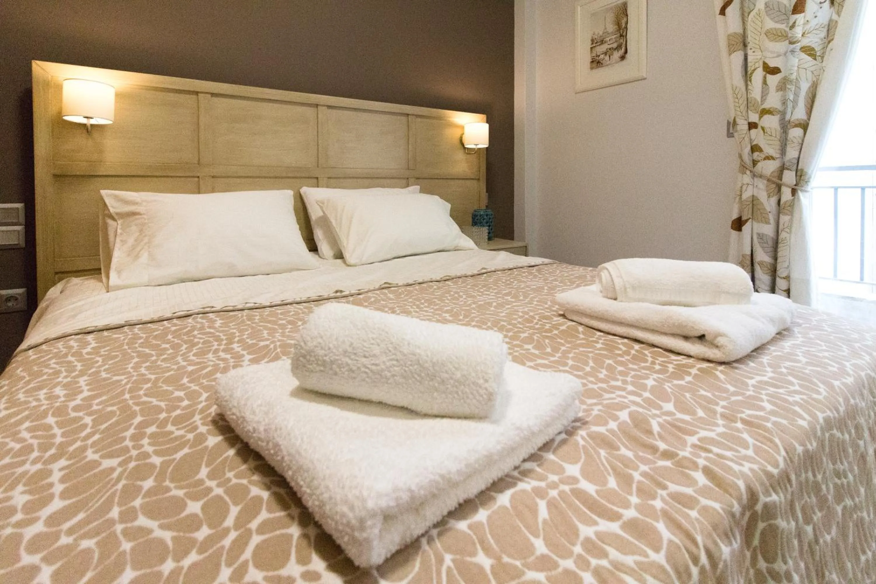 Bed in Luxury Apartment Philoxenia