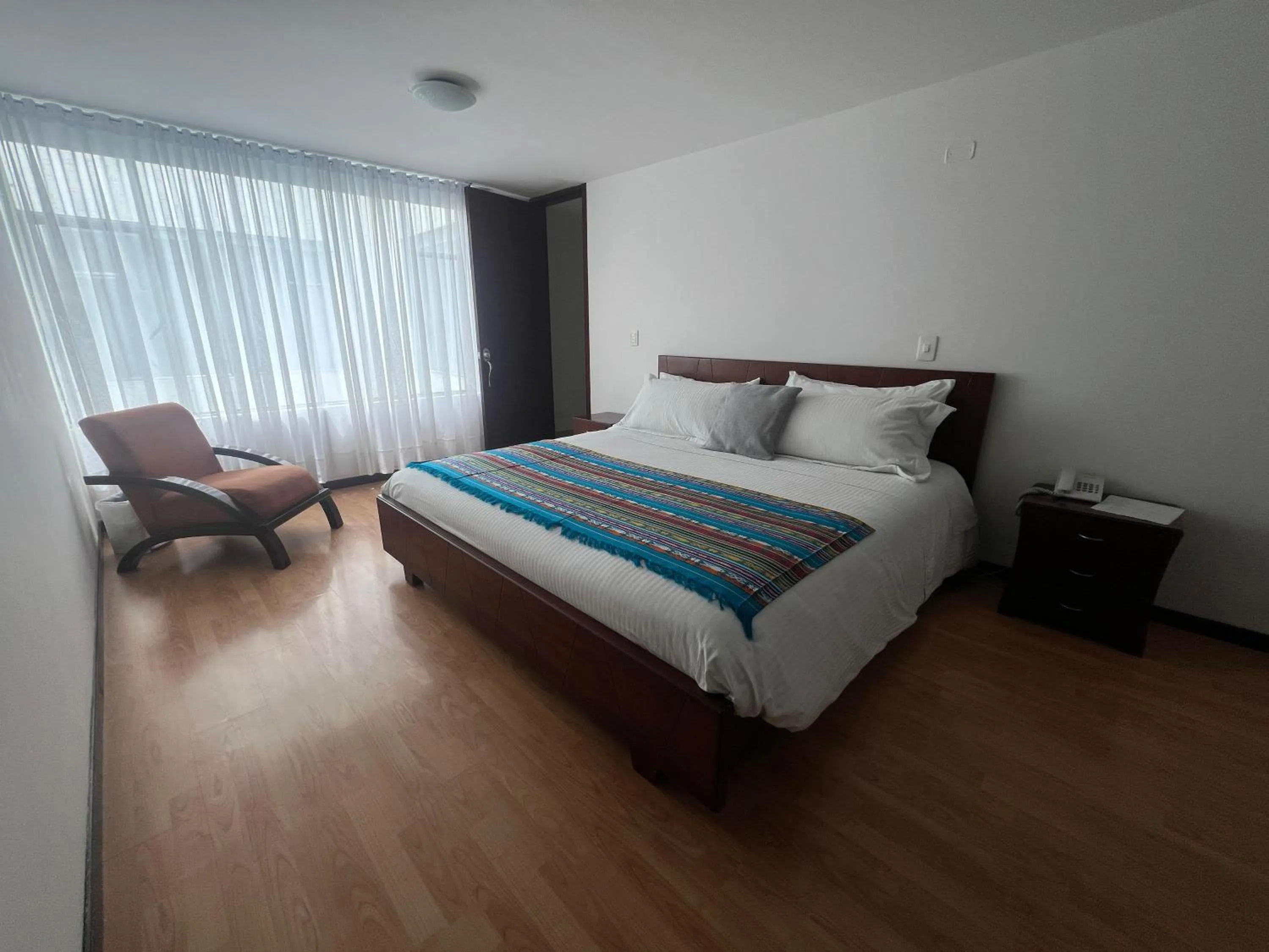 Bed in Nogal Suite Hotel Pasto