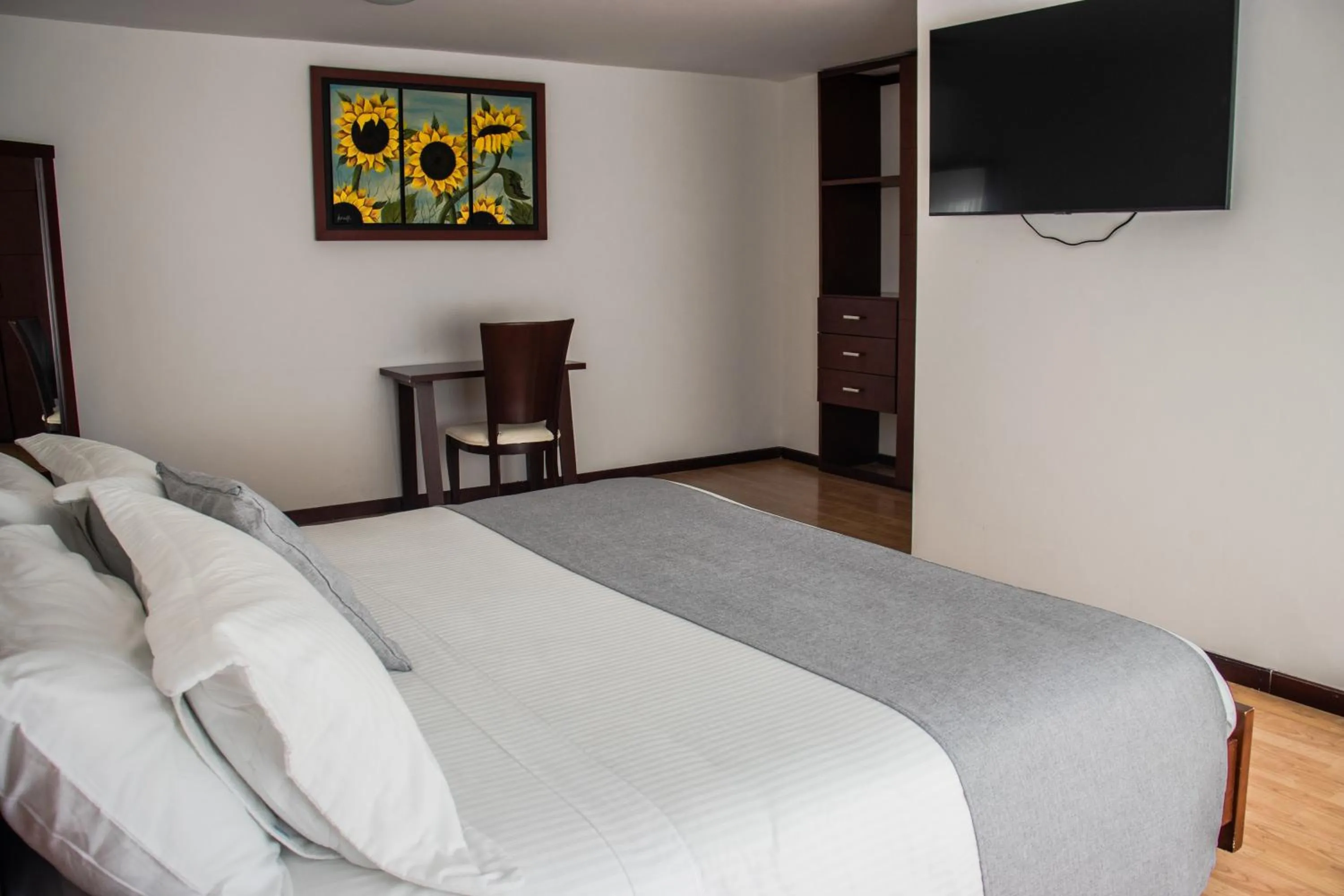 Bed in Nogal Suite Hotel Pasto
