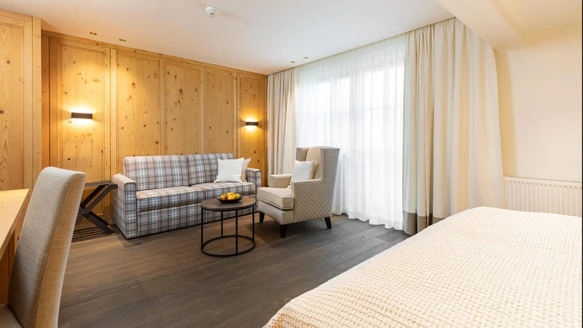 Seating area, Bed in Hotel Grünauerhof