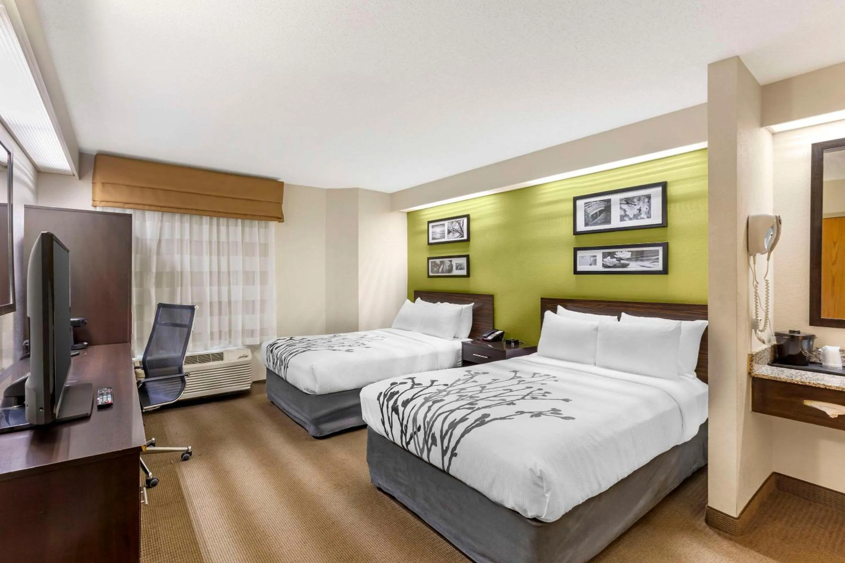 Bed in Sleep Inn at Greenville Convention Center