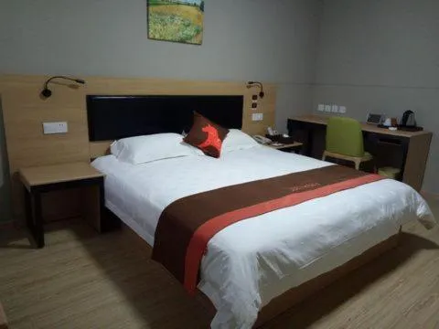 Bed in JUNYI Hotel Niongbo Xiangshan Bus Station