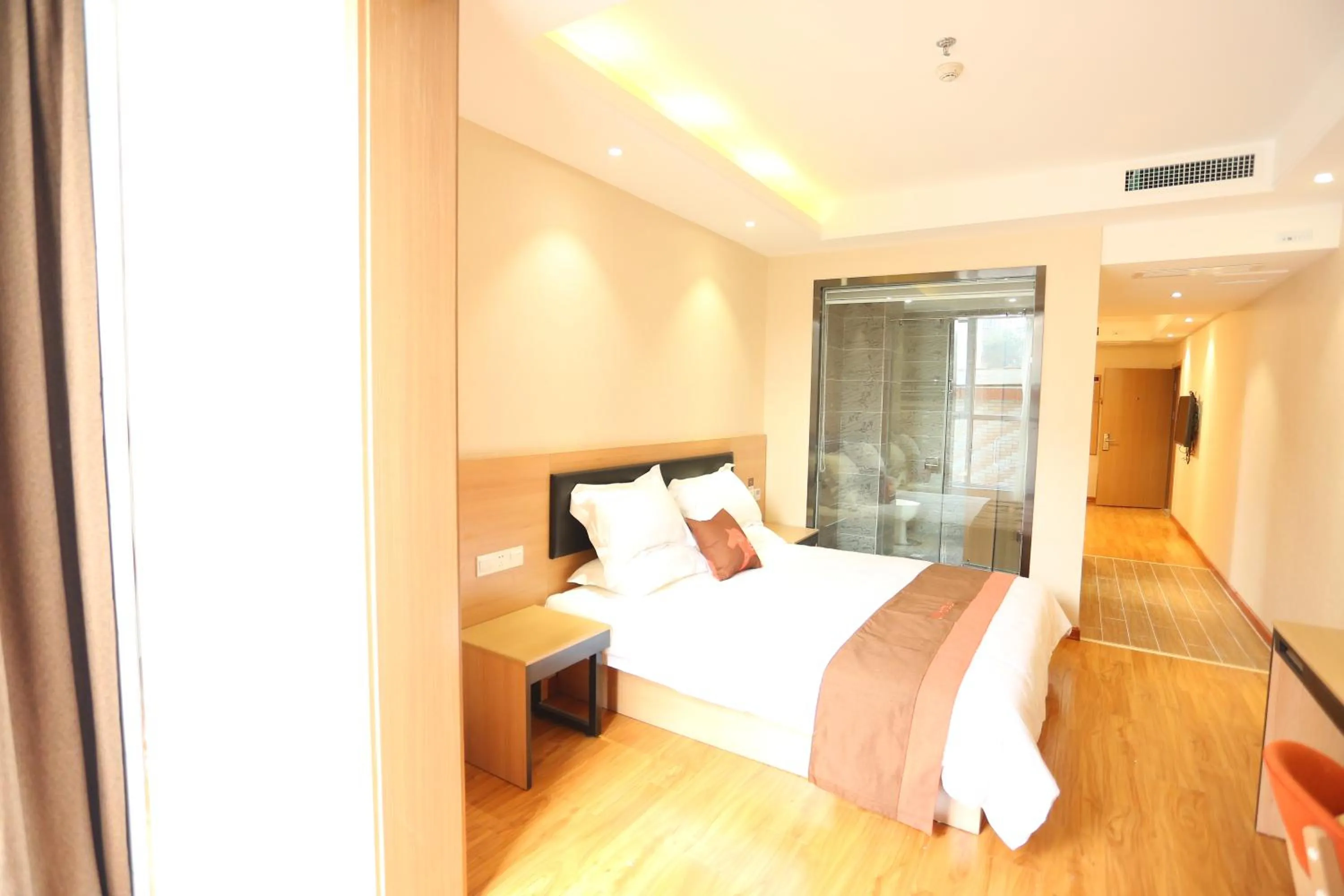 Bed in JUNYI Hotel Hebei Shijiazhuang Pingshan Town Wanshou Road