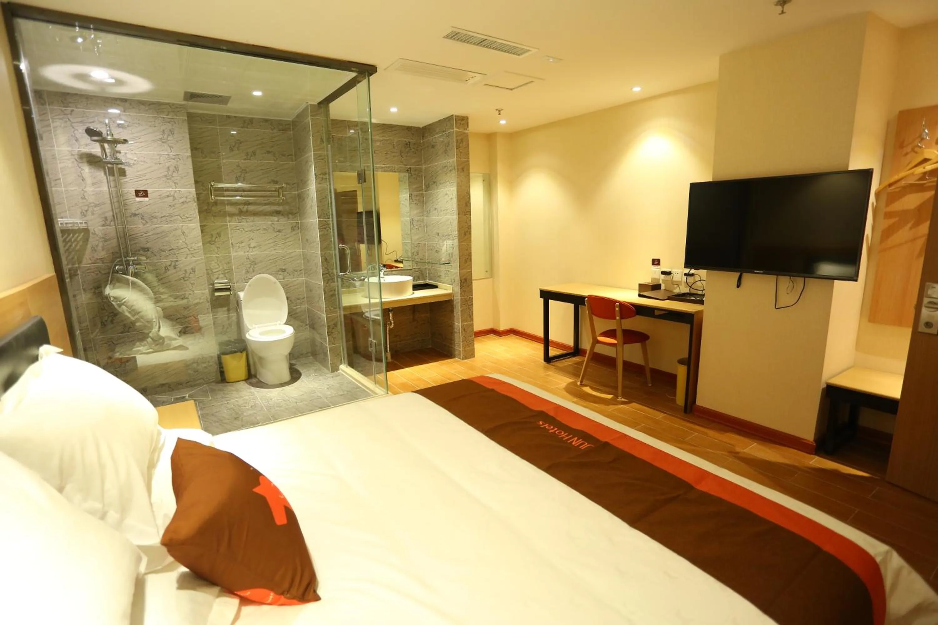 Bed in JUNYI Hotel Hebei Shijiazhuang Pingshan Town Wanshou Road