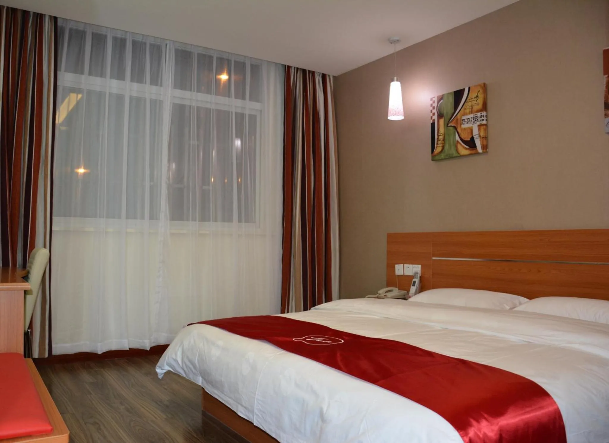Bed in Thank Inn Chain Hotel Jiangsu Yangzhong Avenue