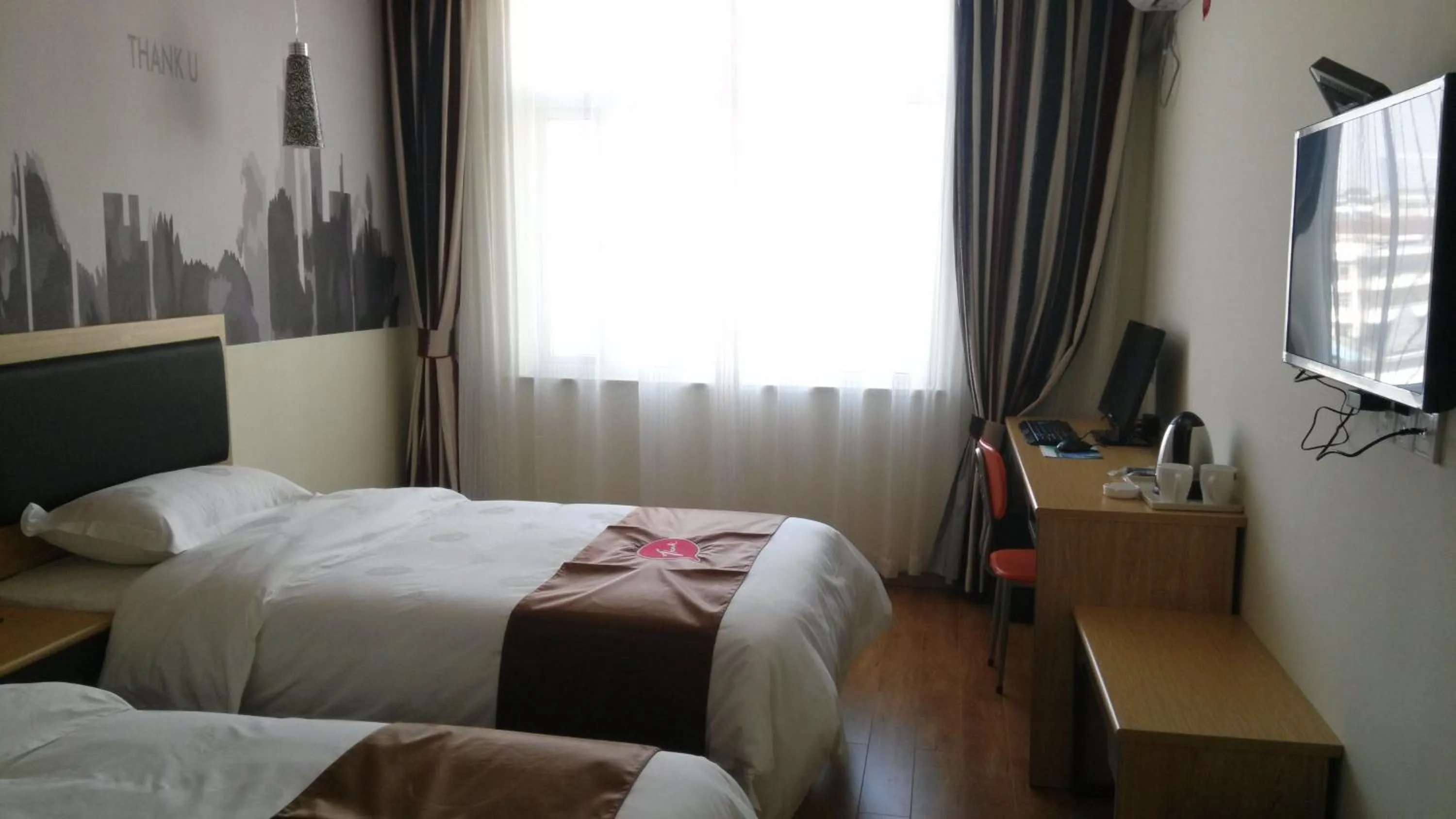 Bed in Thank Inn Chain Hotel Jiangxi Fuzhou Linchuan District Laowuhuang Palace Bus Station
