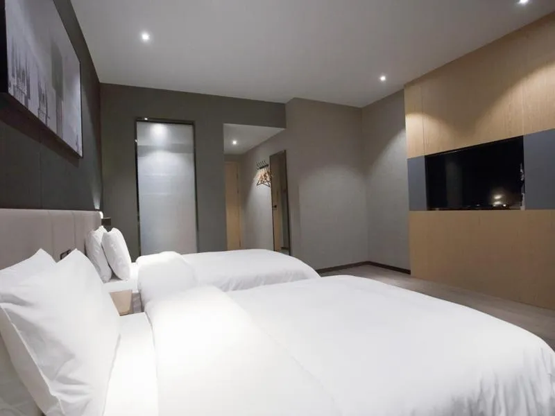 Bed in Thank Inn Chain Hotel Hunan Huaihua Hecheng District South High Speed Rail Station