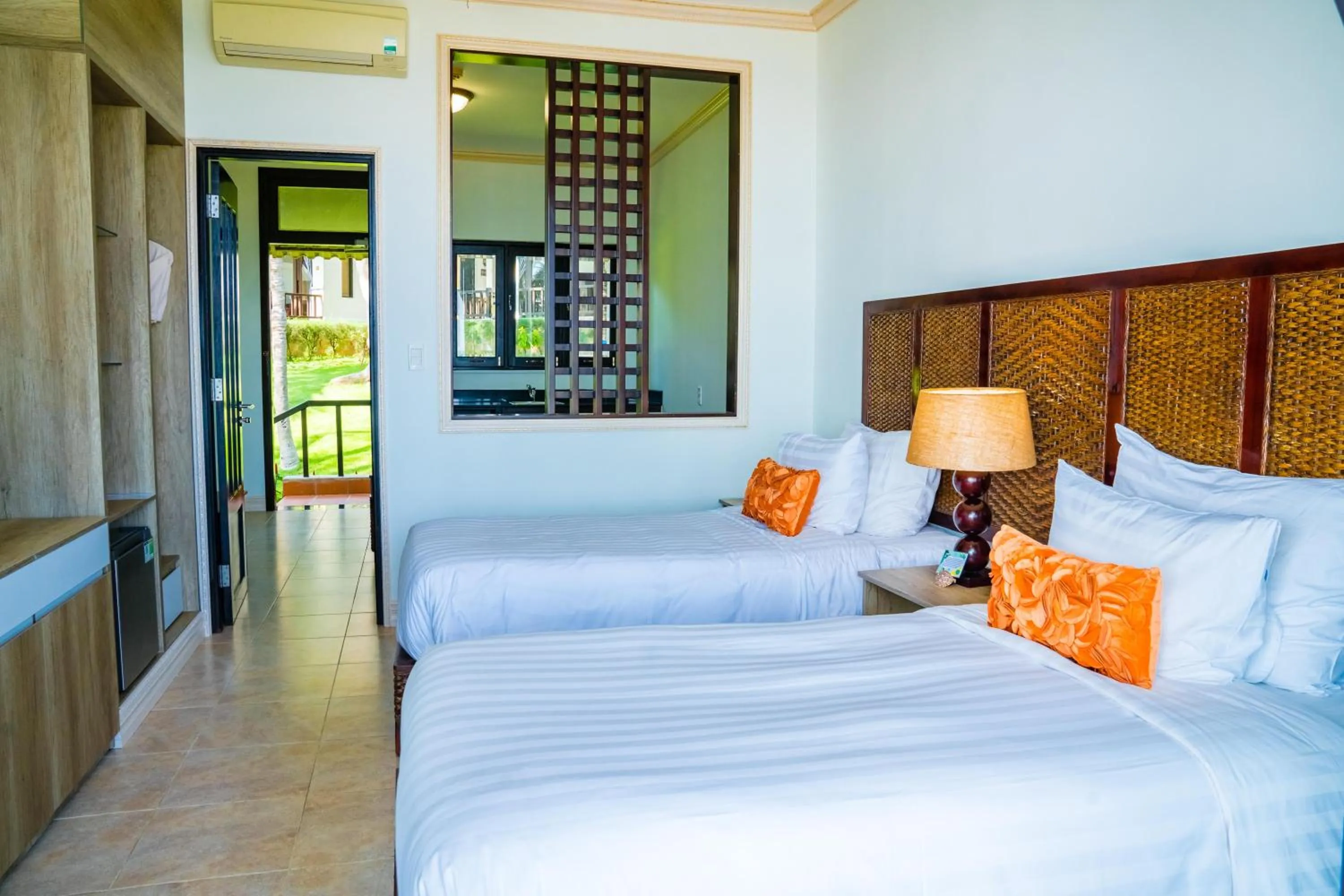 Bed in Lotus Muine Resort & Spa