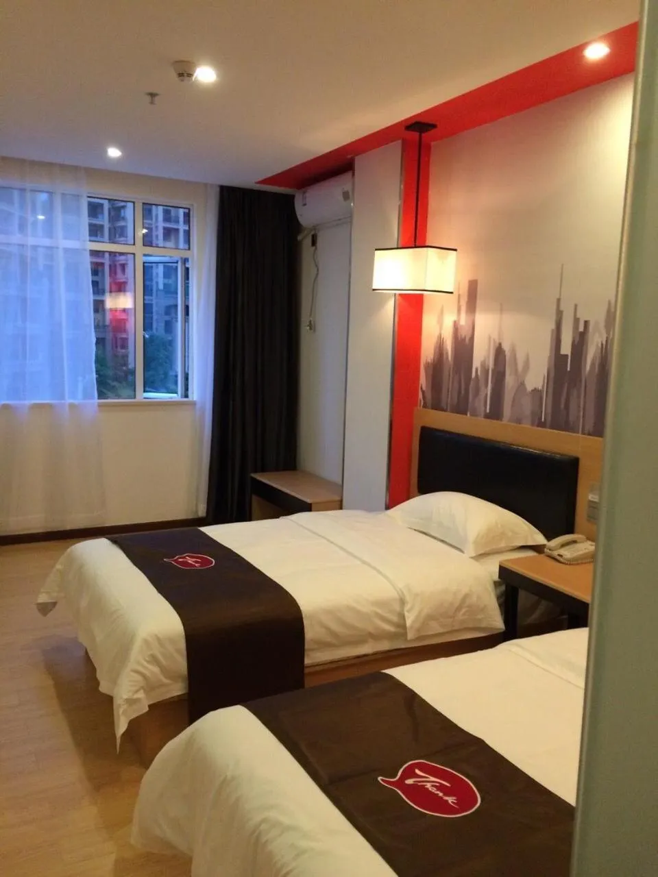 Bed in Thank Inn Chain Hotel Guangdong Shenzhen Longhua Qinghu Subway Station