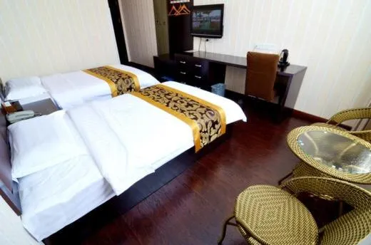 Bed in JUNYI Hotel Shaanxi Xi'an North 3rd Ring Daminggong Building Materials Market