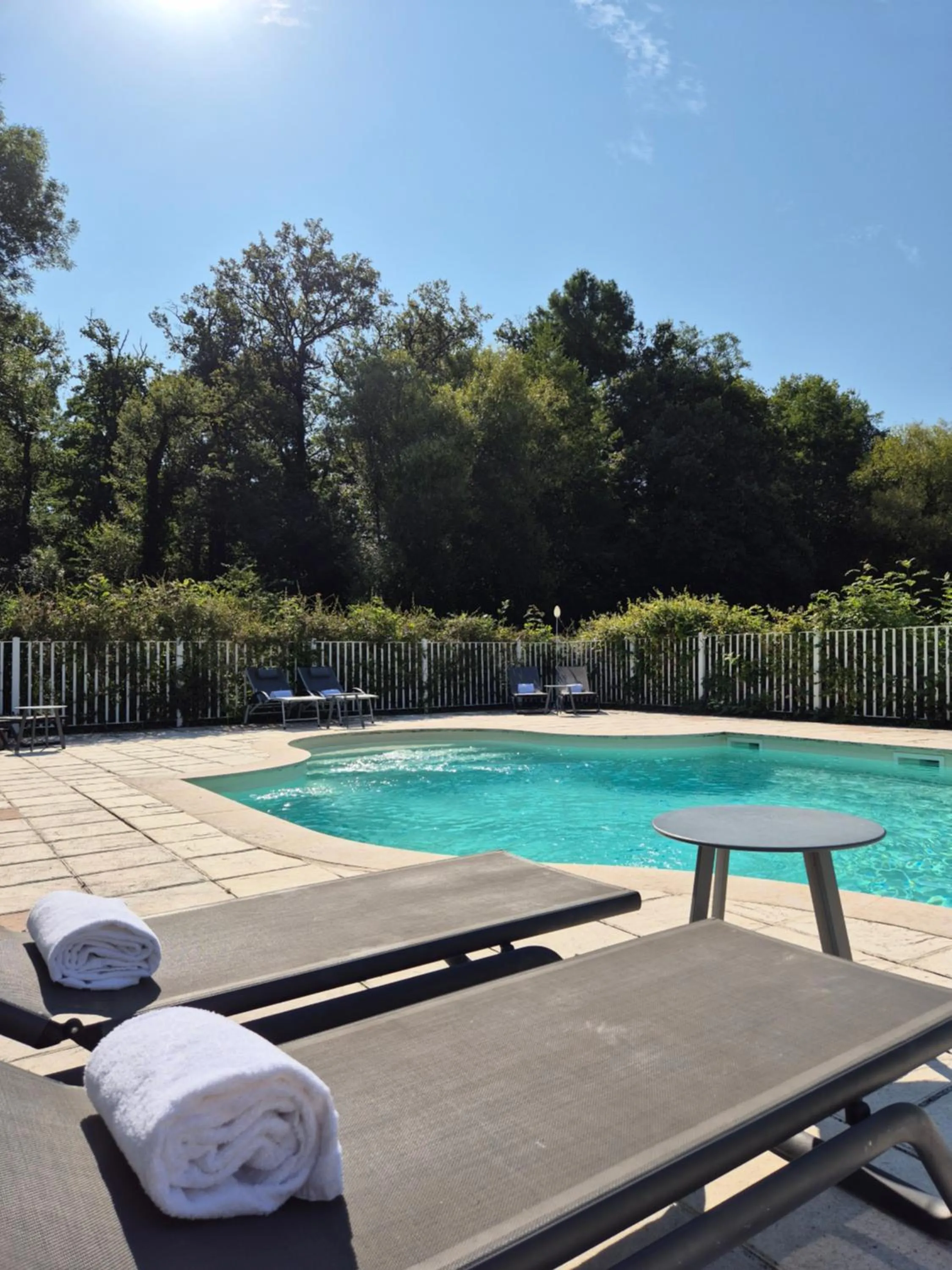 Swimming pool in Hostellerie Du Château Les Muids