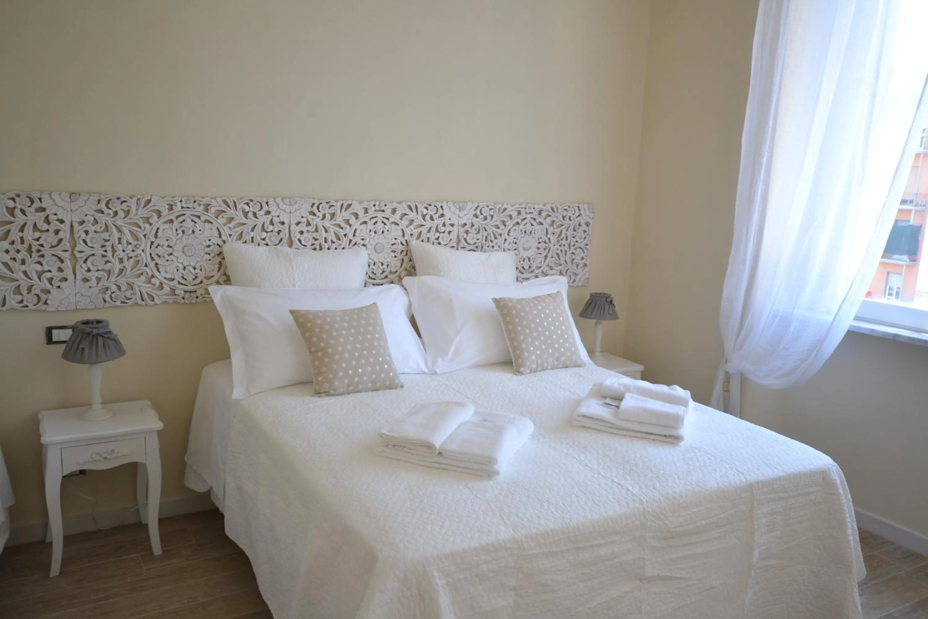 Decorative detail, Bed in Affittacamere Casa Dane'