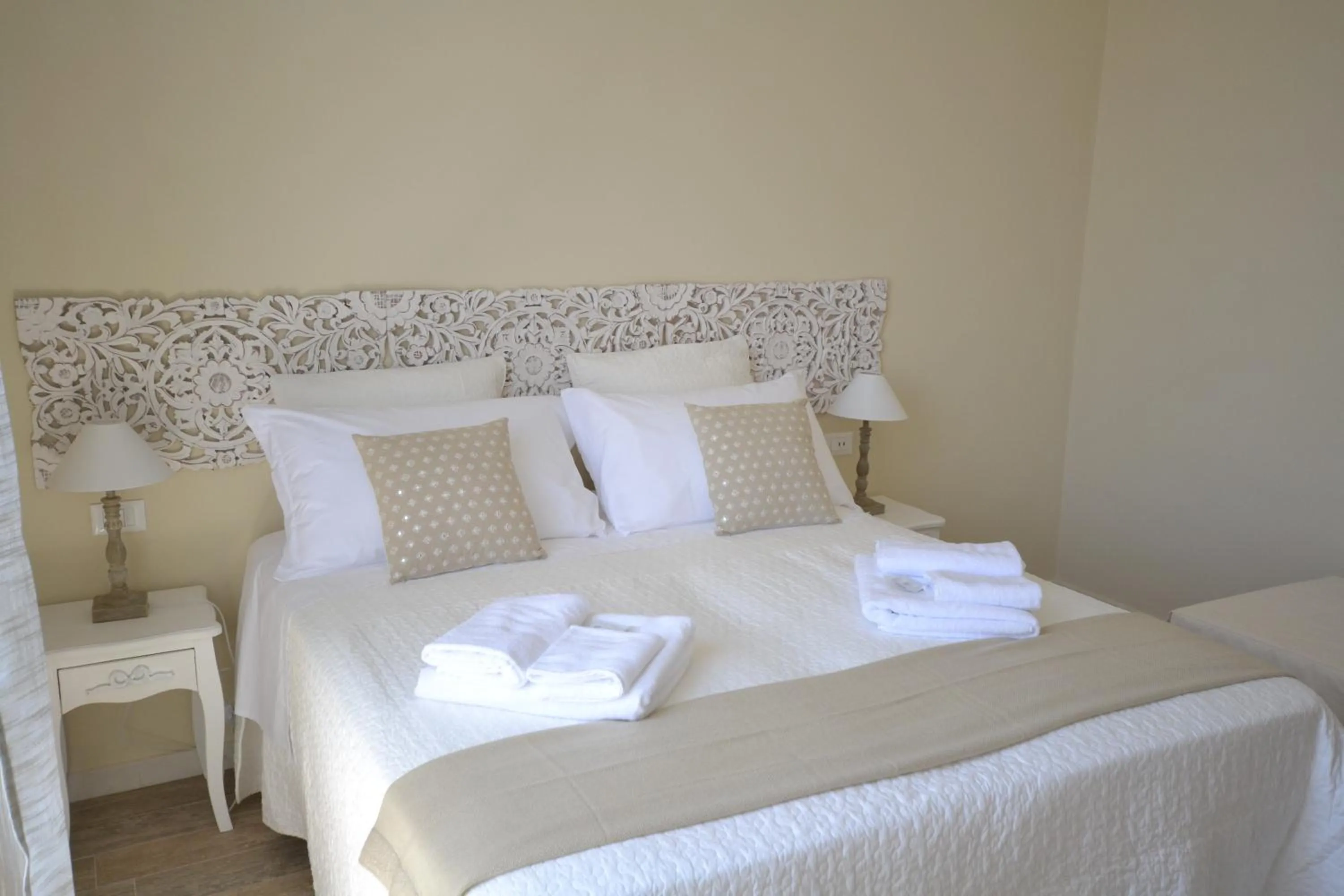 Decorative detail, Bed in Affittacamere Casa Dane'