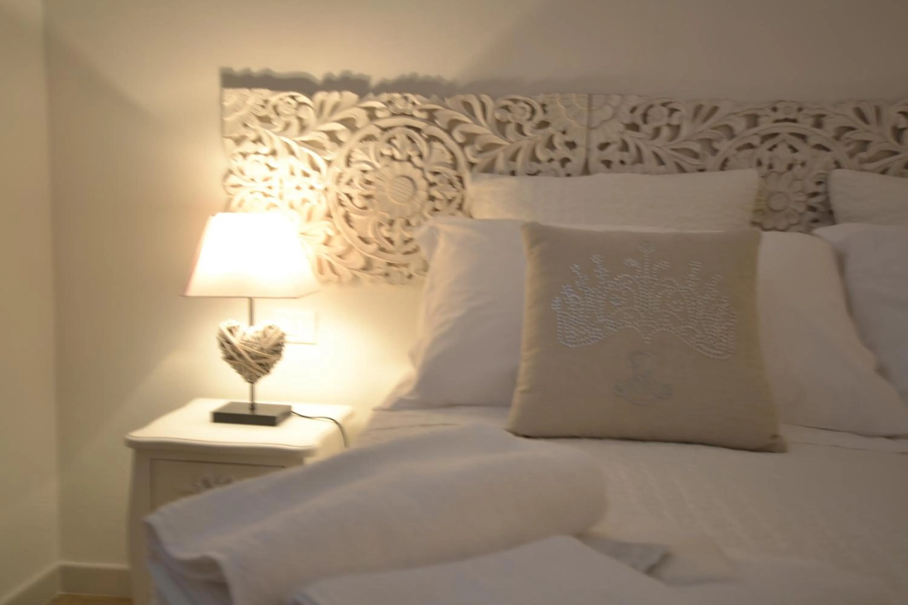 Decorative detail, Bed in Affittacamere Casa Dane'