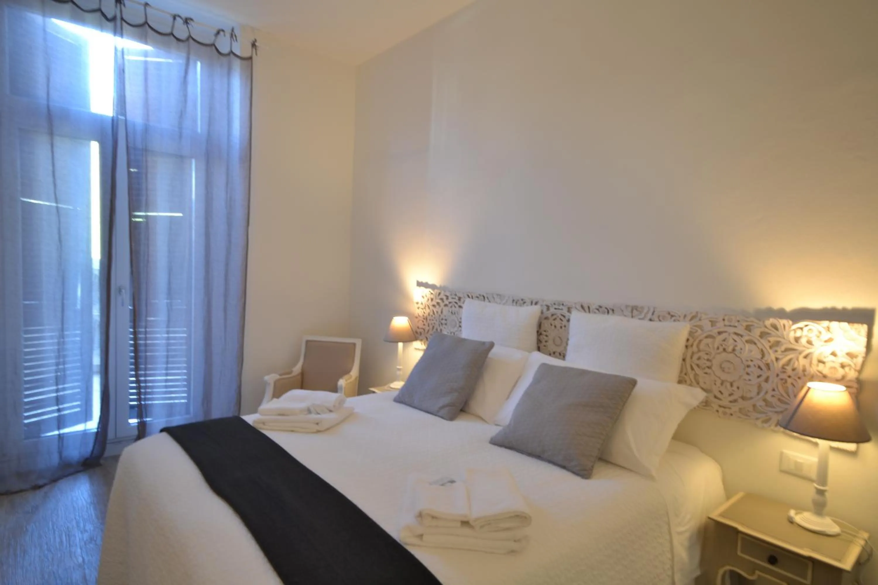 Decorative detail, Bed in Affittacamere Casa Dane'