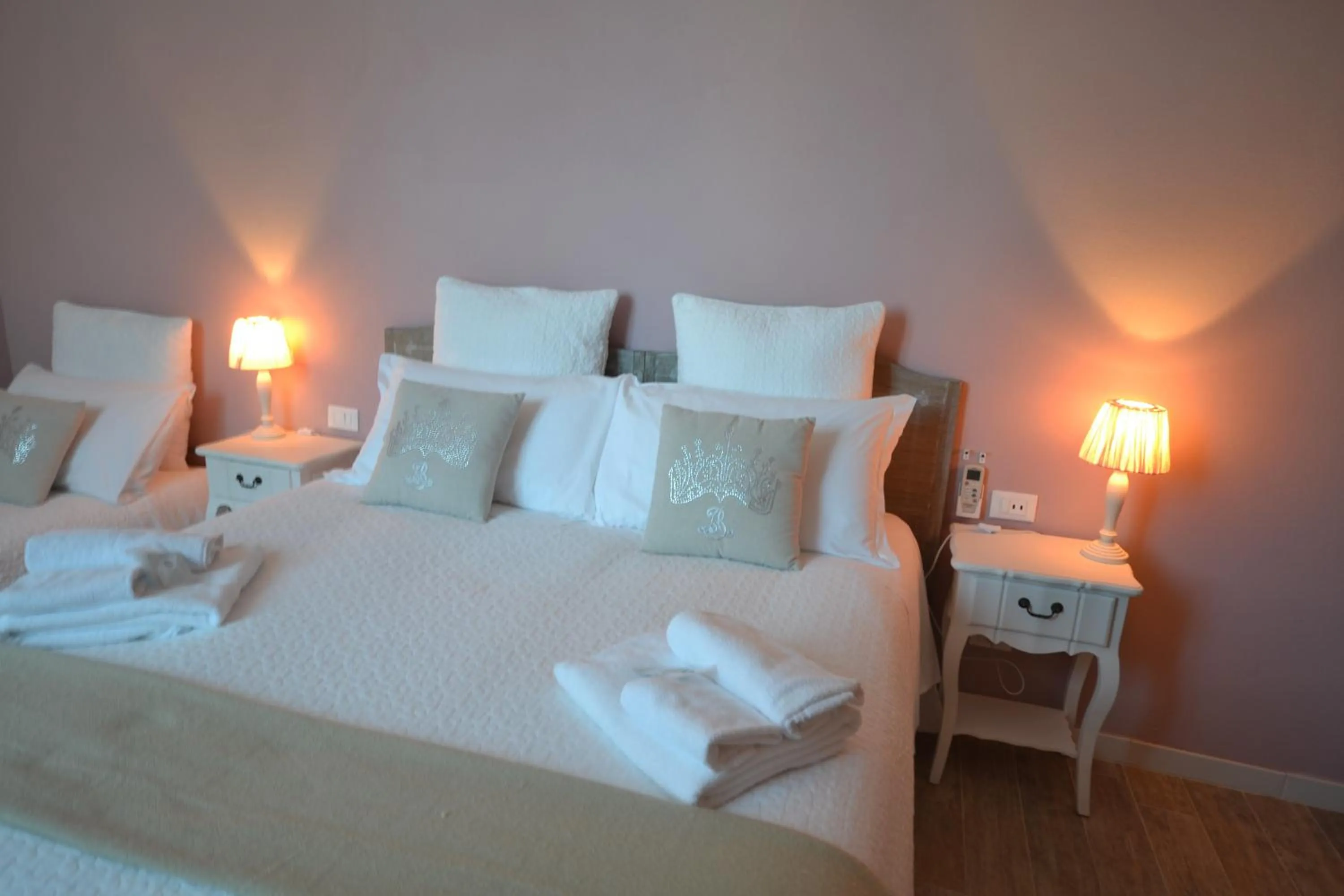 Decorative detail, Bed in Affittacamere Casa Dane'