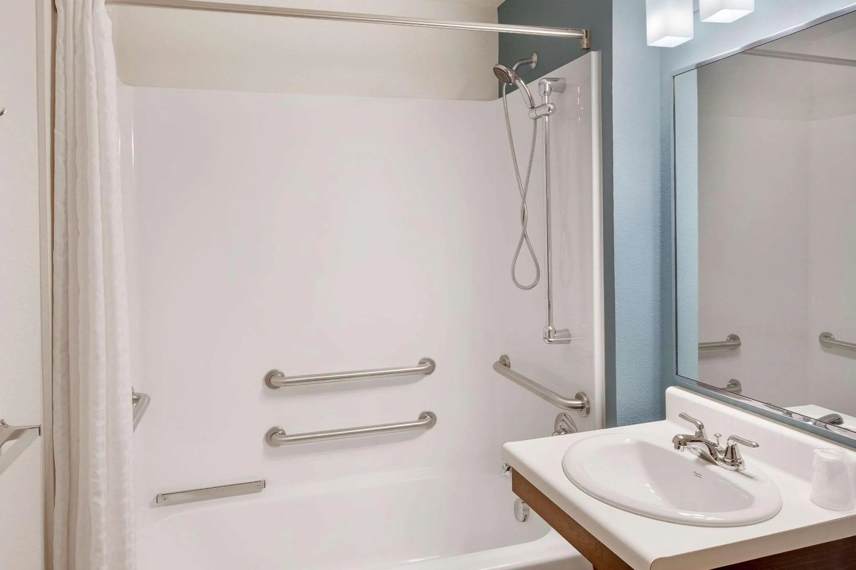 Bathroom in WoodSpring Suites Las Colinas - Northwest Dallas