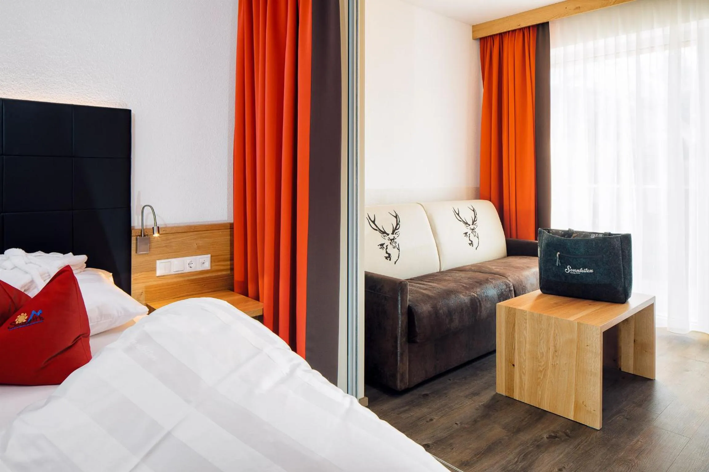 Seating area, Bed in Hotel Sonnleiten