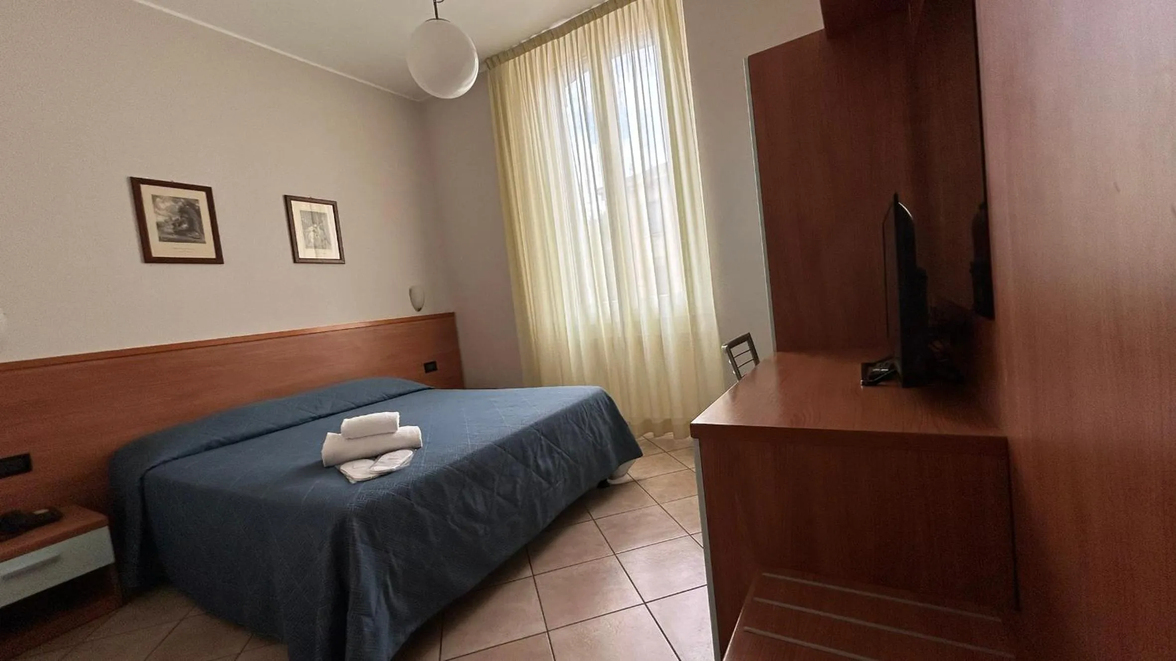 Bed in Albergo Salerno