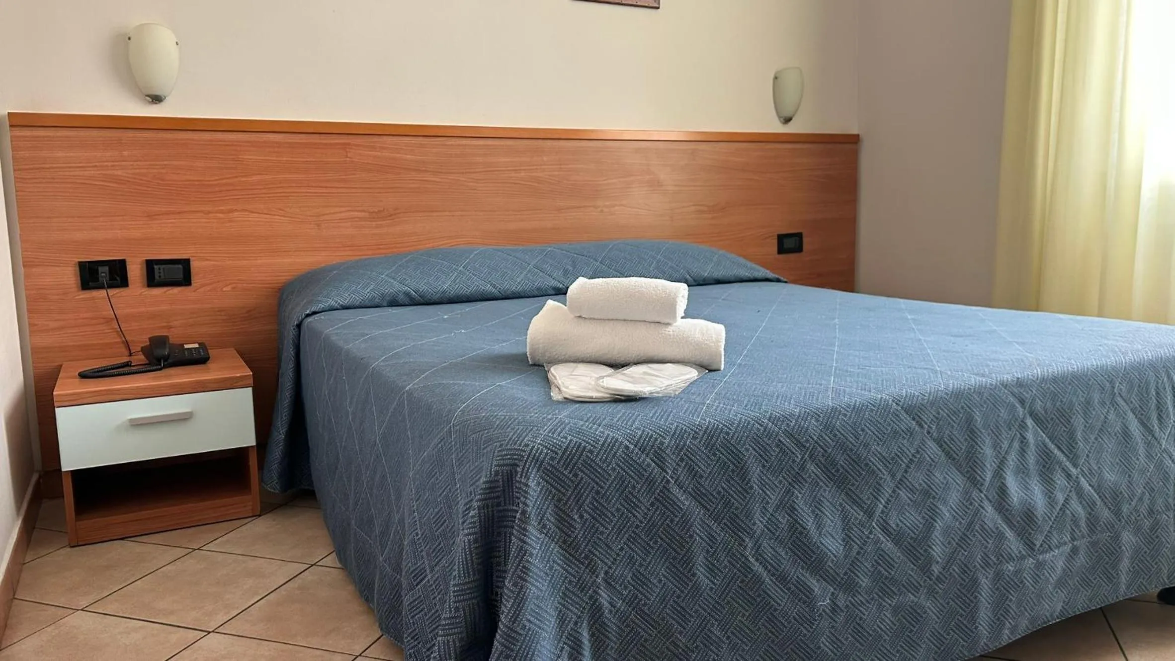Bed in Albergo Salerno