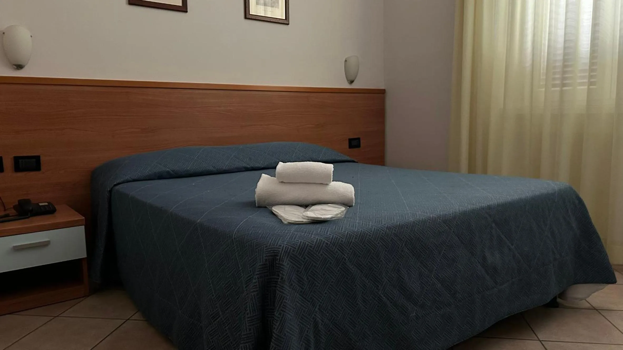 Bed in Albergo Salerno