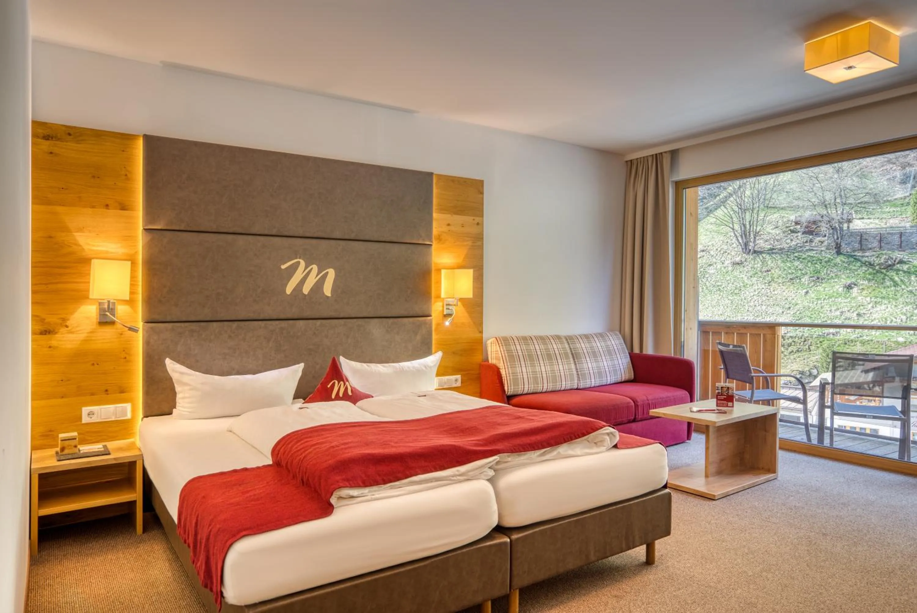 Photo of the whole room, Bed in Mallaun Hotel.Erlebnis